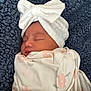 baby, bed, blanket, bonnet, cap, clothing, cushion, face, furniture, glove, hat, head, homedecor, newborn, person, photography, portrait, quilt, sleeping, towel