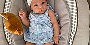 Emma Peña Bello joined the competition — help win amazing prizes! baby, infant, child, baby_seat, headband, bow, socks, plush_toy, bee_toy, bear_toy, clothing, carpet, indoor, cute, portrait, smiling, person, baby_girl, soft_toys, comfortable