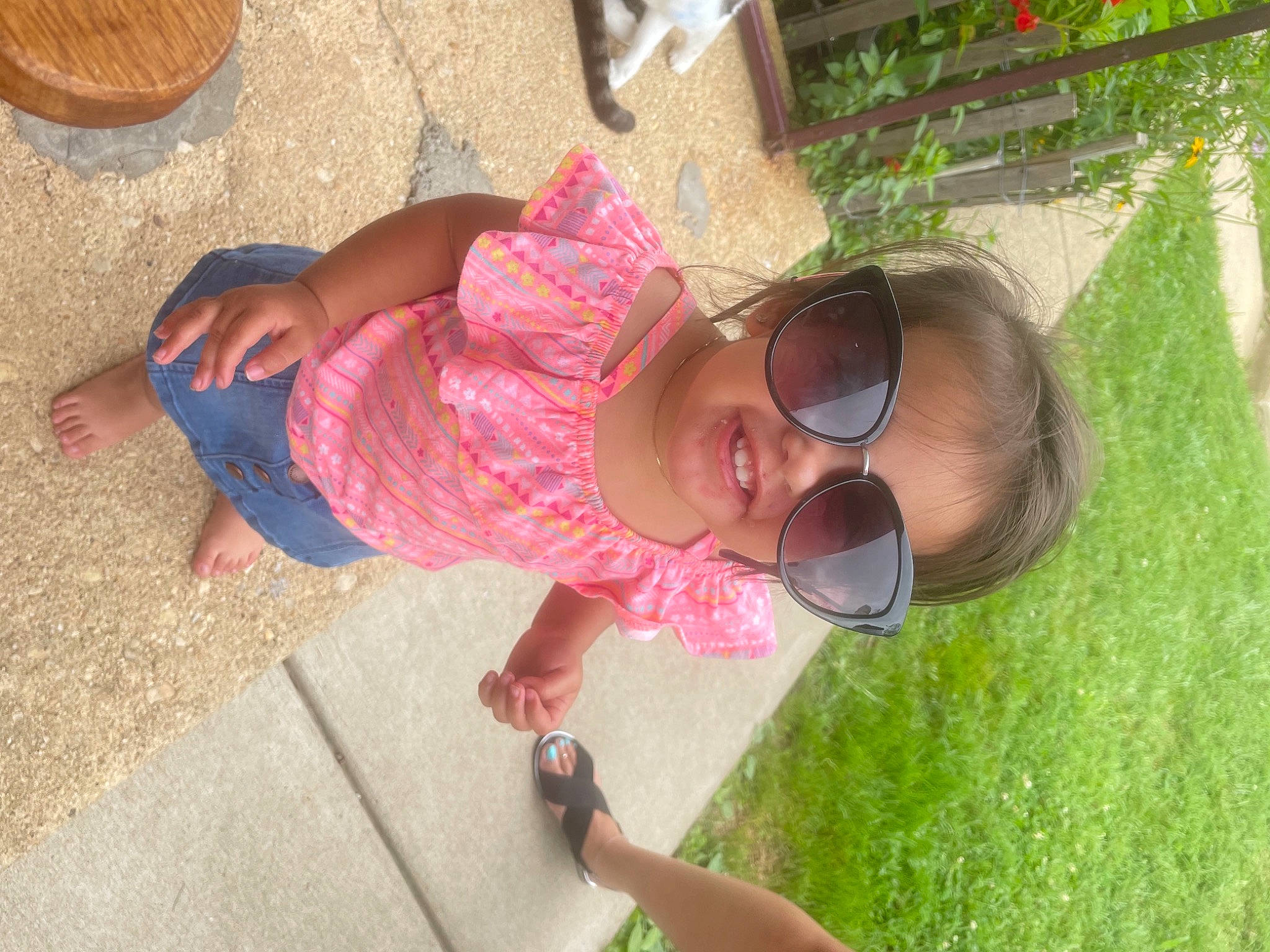 Avayah is registered to the contest to win money with this photo: adaptation, eyewear, face, facial_expression, fun, goggles, grass, grass_family, happy, head, joy, leisure, mouth, nose, person, pink, plant, skin, smile, summer