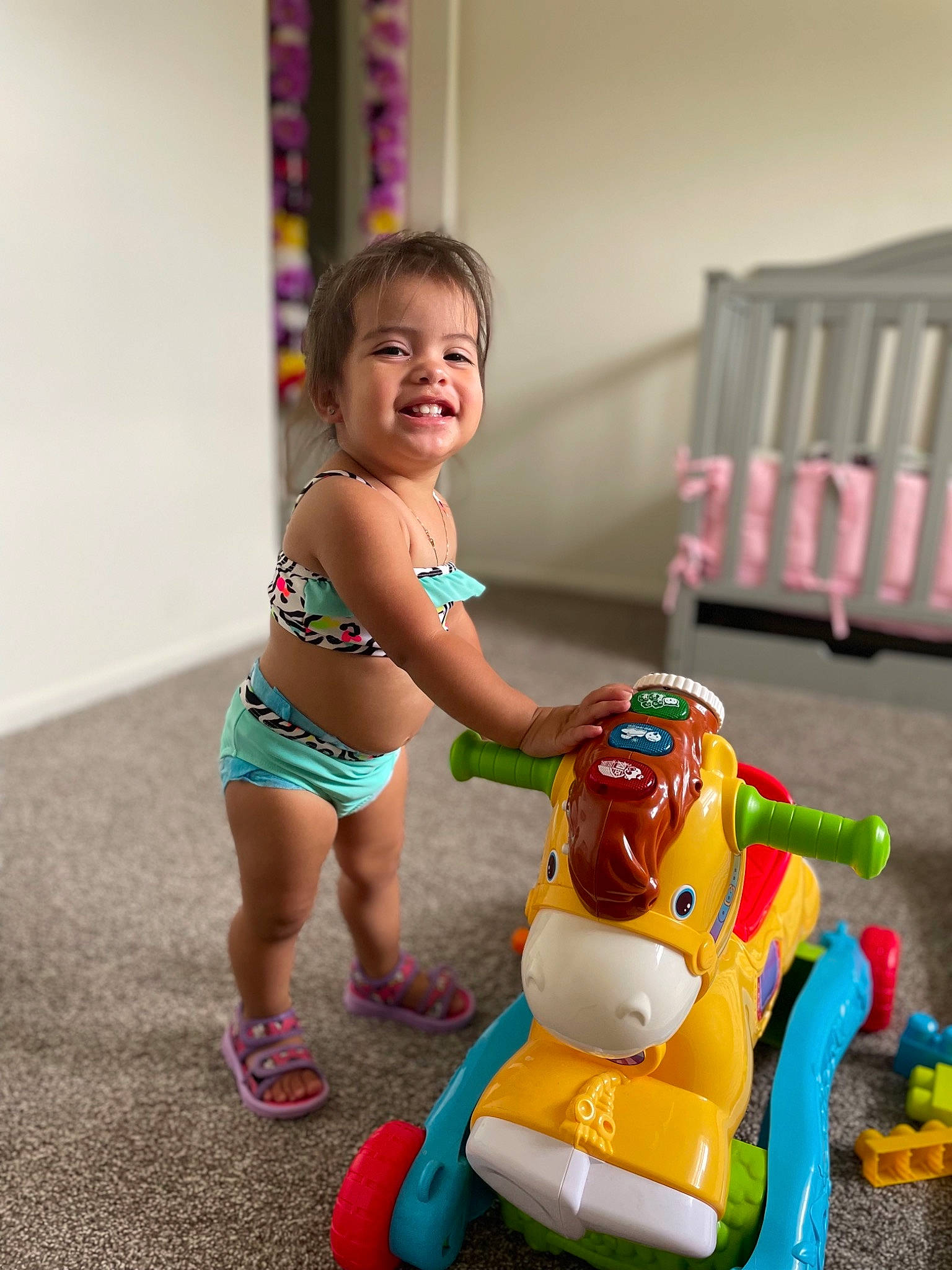 Avayah joined the competition — help win amazing prizes! baby, baby_playing_with_toys, baby_toddler_clothing, child, event, facial_expression, fun, happy, human_leg, joy, leisure, person, play, recreation, room, shorts, sitting, smile, sneakers, thigh