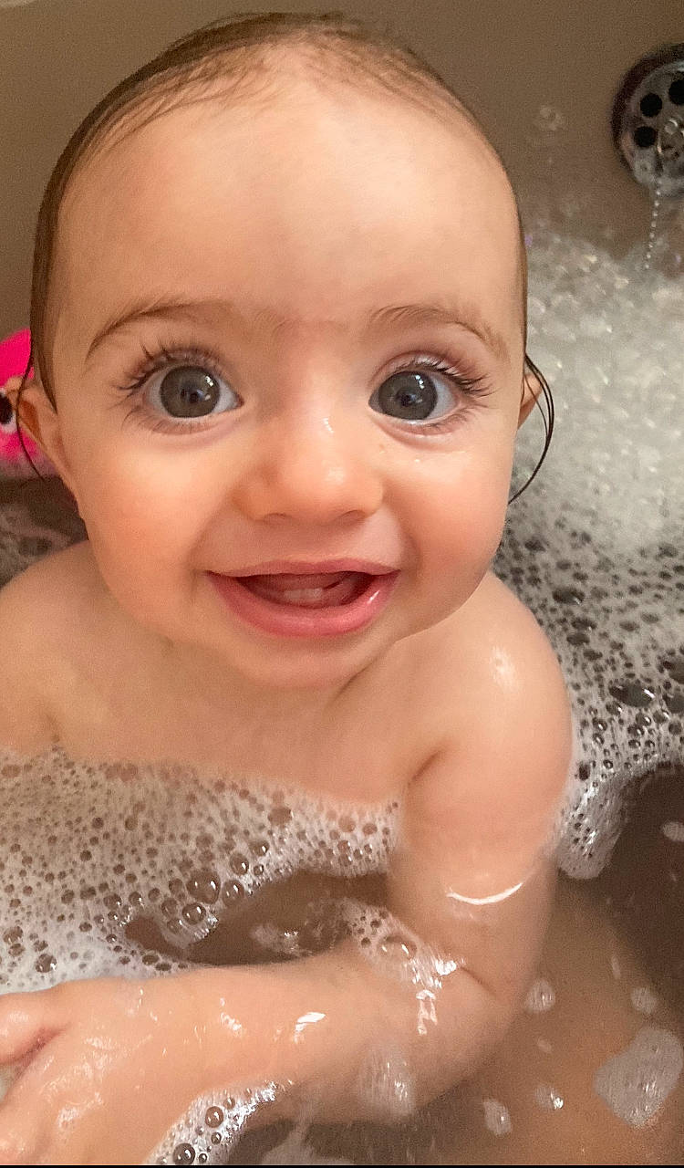 Darcey joined the competition — help win amazing prizes! baby_bathing, cheek, chin, eye, eyebrow, eyelash, face, facial_expression, forehead, hair, hairstyle, head, lip, mouth, muscle, nose, person, product, skin, smile