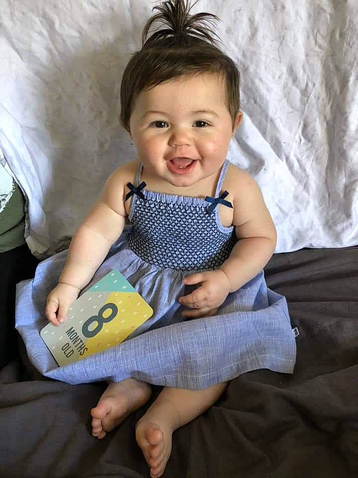 Amarni is registered to the contest to win money with this photo: baby, baby_toddler_clothing, child, joy, person, sitting, skin, smile, toddler