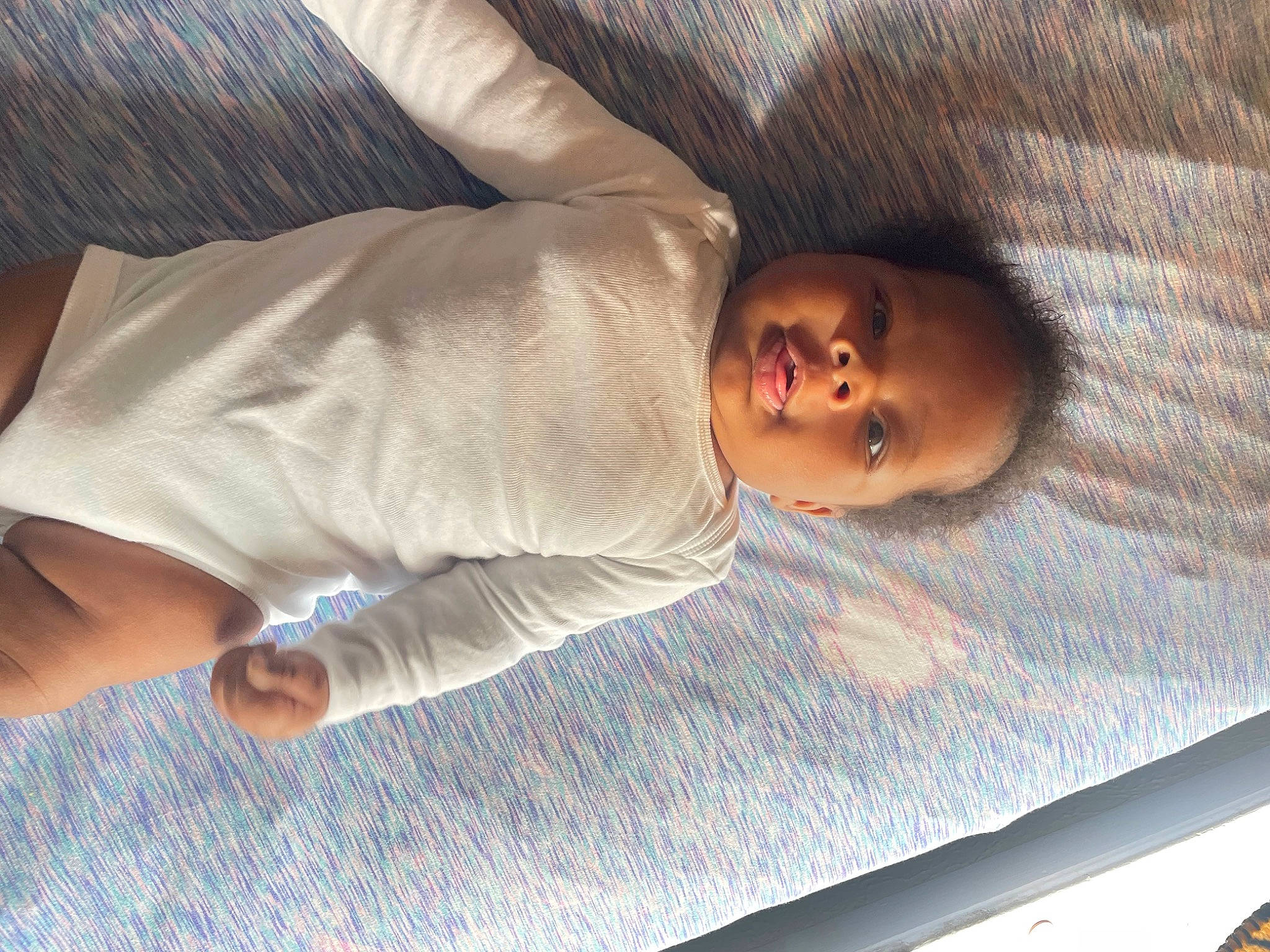 Caiden joined the competition — help win amazing prizes! baby, baby_toddler_clothing, bedding, bedtime, child, comfort, finger, flooring, foot, hardwood, human_leg, linens, nap, nose, person, room, skin, sleep, sleeve, toddler