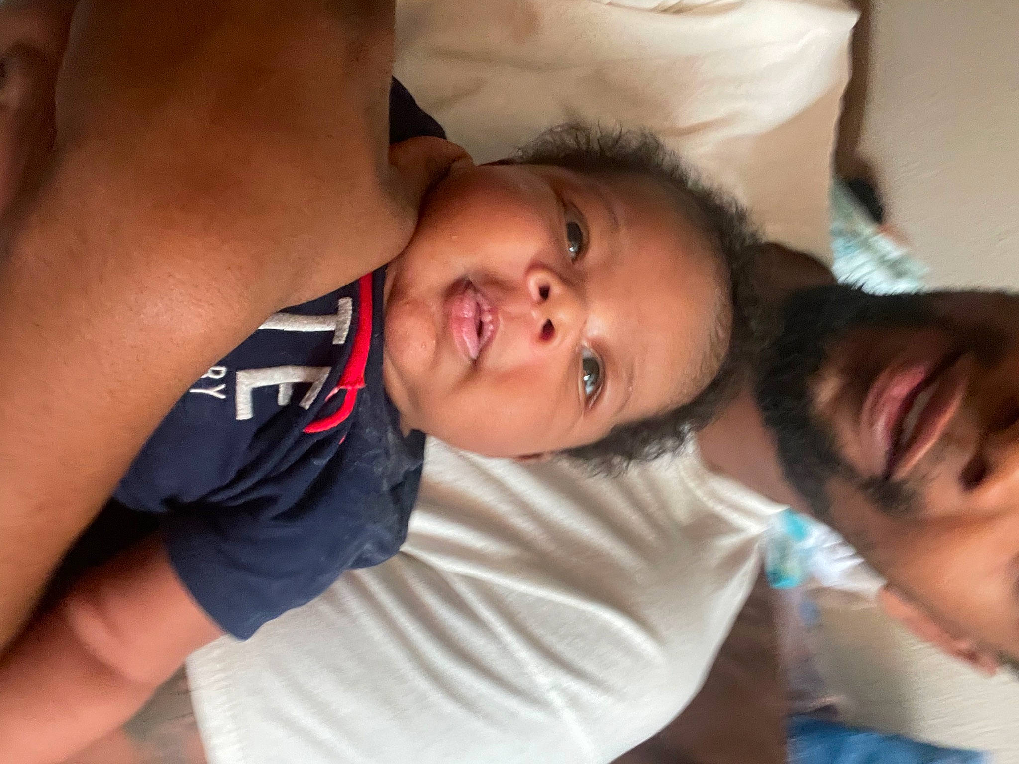 Caiden is registered to the contest to win money with this photo: abdomen, arm, cheek, chest, comfort, ear, elbow, eyelash, forehead, fun, gesture, happy, joint, mouth, muscle, nose, person, shoulder, skin, t_shirt