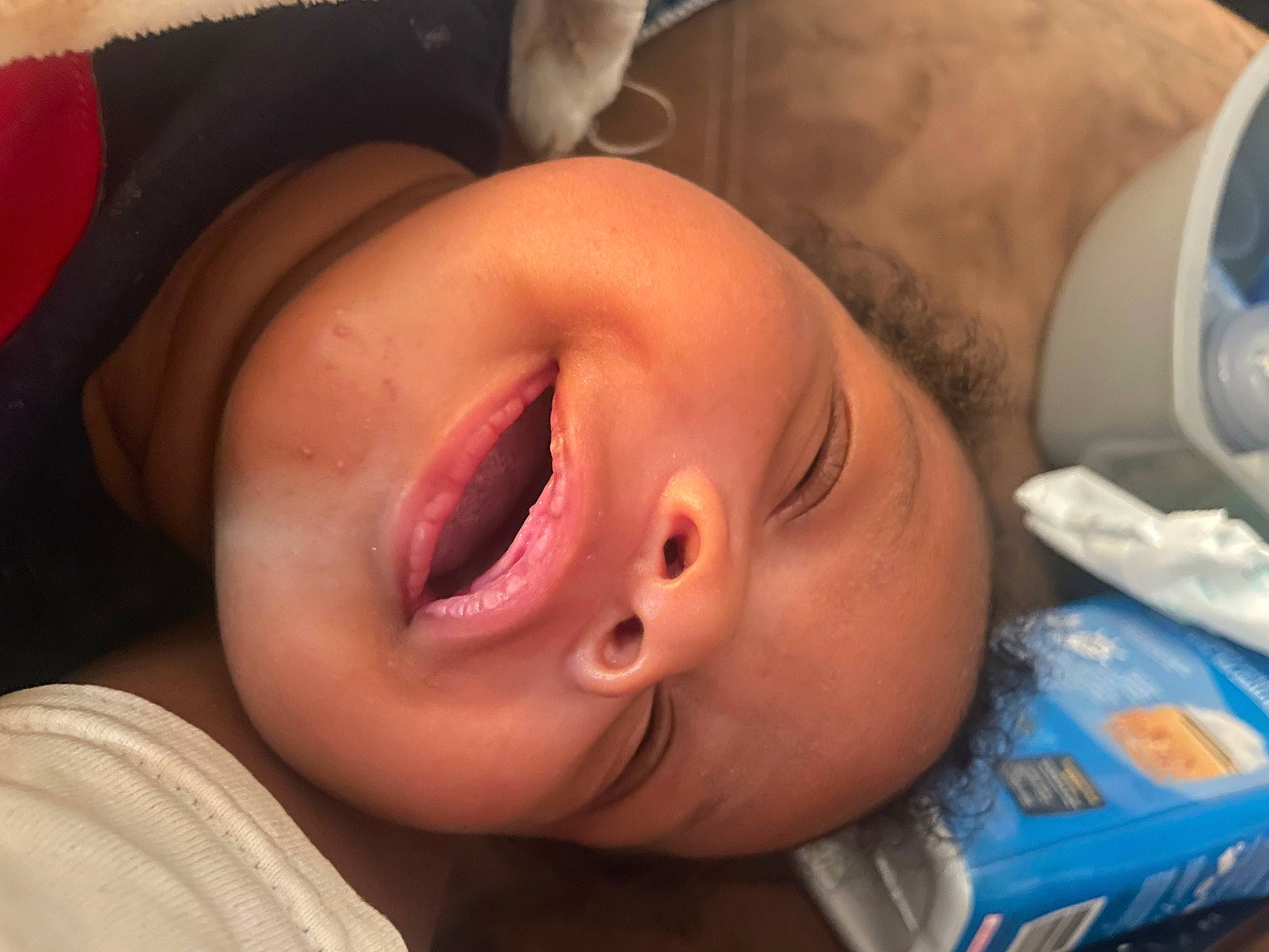 Caiden is registered to the contest to win money with this photo: baby, cheek, child, close_up, comfort, ear, eyebrow, eyelash, fun, gesture, happy, head, iris, jaw, lip, mouth, nose, person, skin, smile