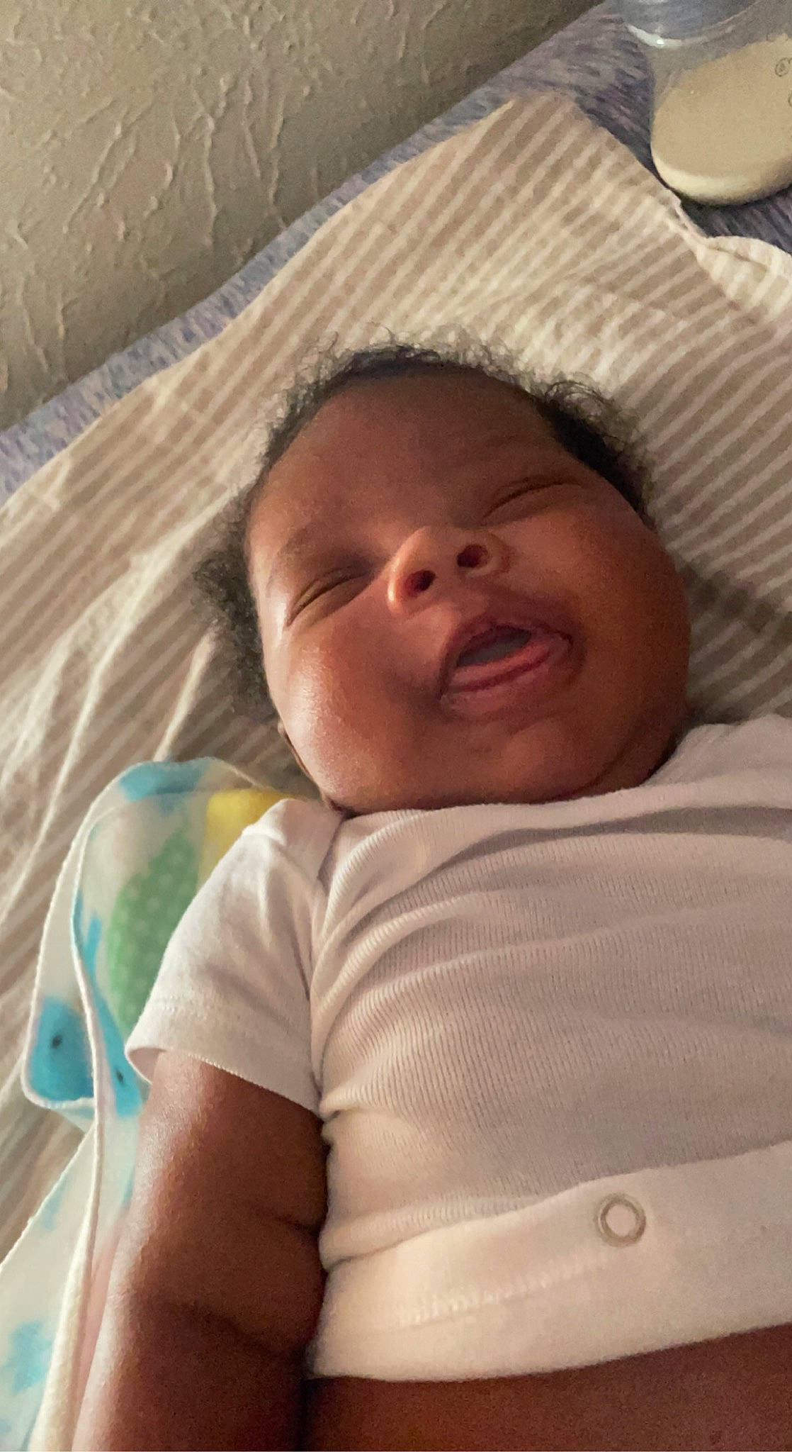 Caiden joined the competition — help win amazing prizes! baby, bedtime, cheek, child, chin, close_up, comfort, eye, eyebrow, face, head, iris, linens, lip, mouth, nose, person, skin, smile, textile