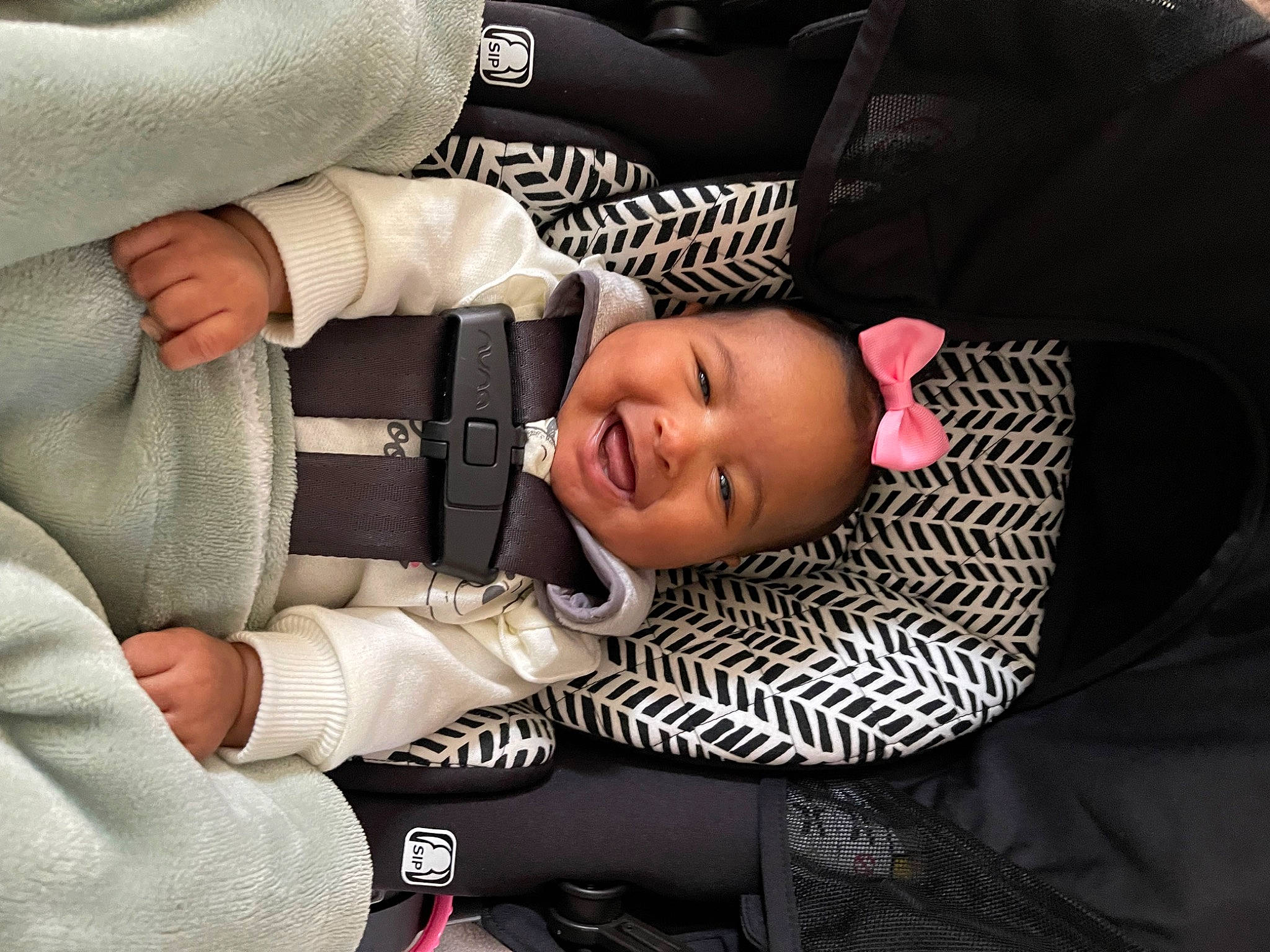 Journey is registered to the contest to win money with this photo: auto_part, baby, baby_carriage, baby_products, baby_toddler_clothing, car_seat, cheek, child, comfort, gesture, happy, joy, nail, nap, pattern, person, sitting, sleeve, smile, thumb