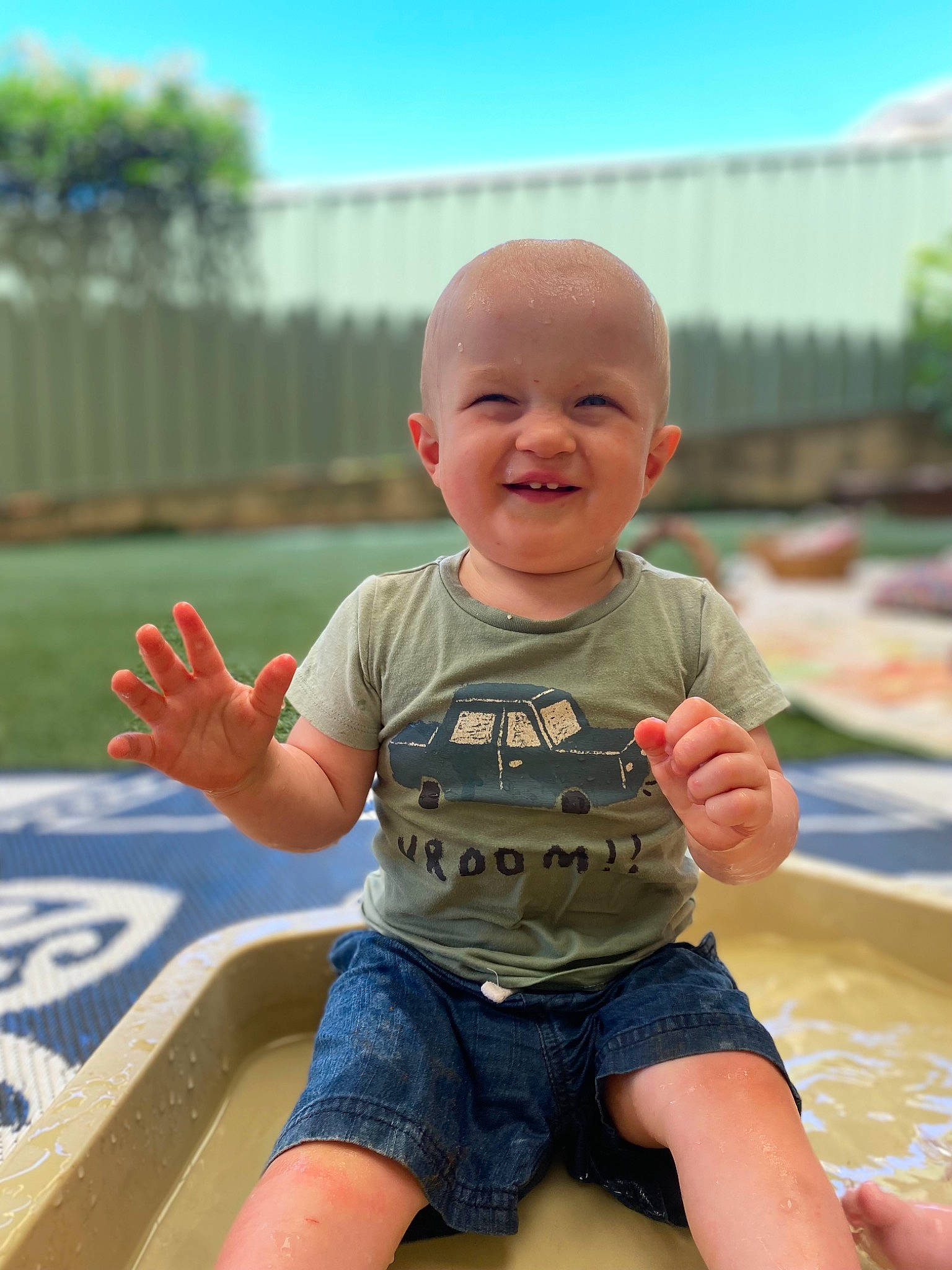 Abel is registered to the contest to win money with this photo: baby, baby_toddler_clothing, barefoot, child, finger, fun, grass, happy, joy, leisure, person, recreation, shorts, sitting, skin, sky, smile, summer, t_shirt, thigh