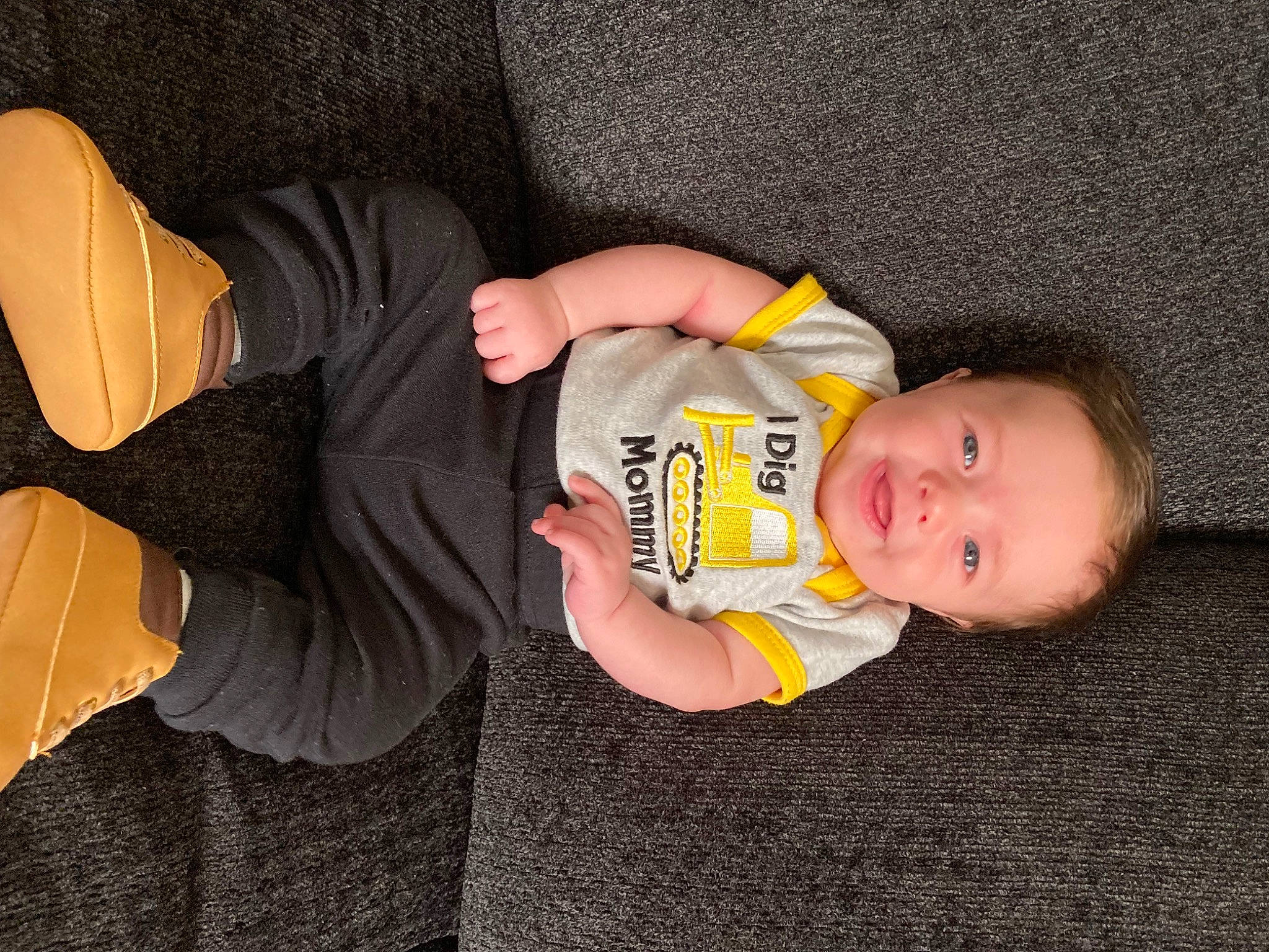 Jayde is registered to the contest to win money with this photo: baby, baby_toddler_clothing, child, comfort, elbow, finger, foot, gesture, hand, human_body, human_leg, knee, mammal, person, sitting, sleeve, sock, t_shirt, thigh, thumb