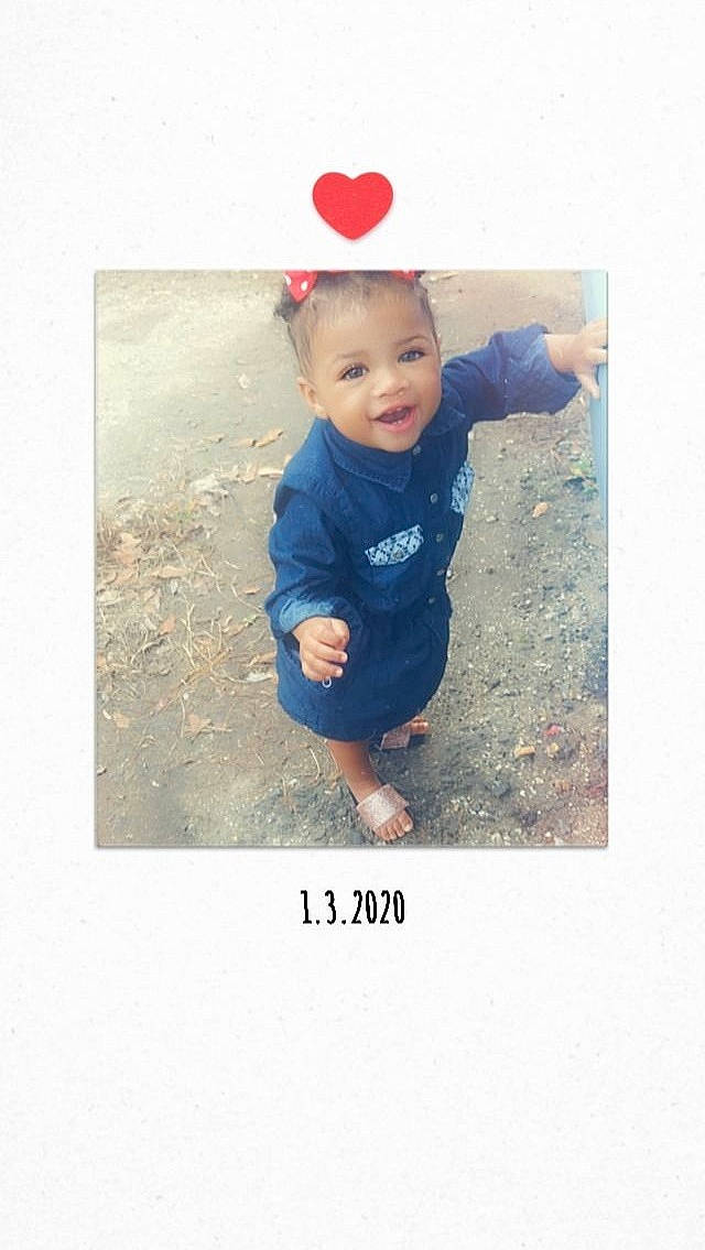 Lyric is registered to the contest to win money with this photo: baby, child, happy, pattern, person, photo_caption, photograph, photography, play, sleeve, smile, snapshot, t_shirt, text, toddler