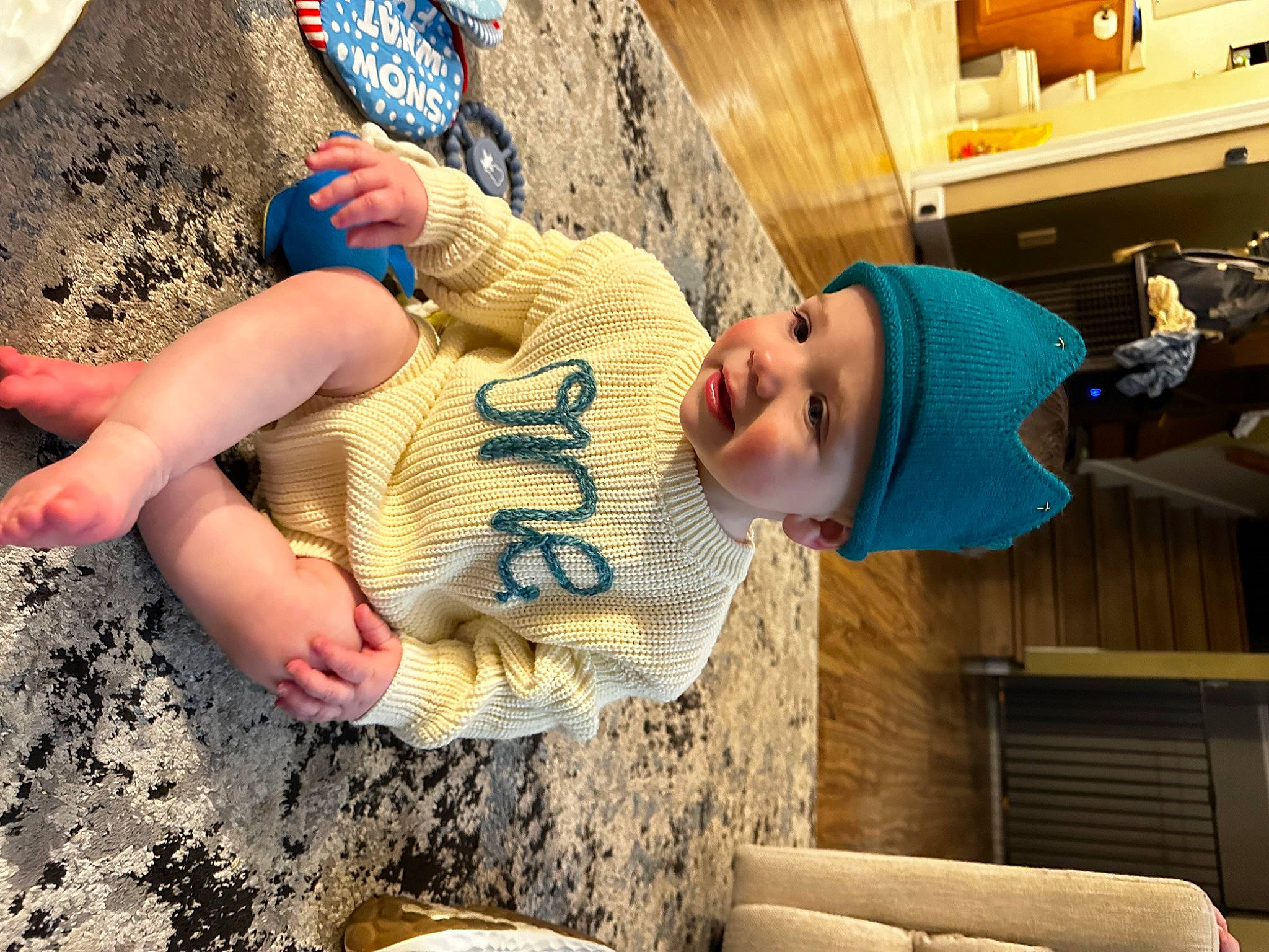 Ace joined the competition — help win amazing prizes! baby, cap, child, electric_blue, fashion_accessory, foot, fun, happy, hat, headwear, leisure, pattern, person, rock, sleeve, smile, soil, t_shirt, toddler, vacation