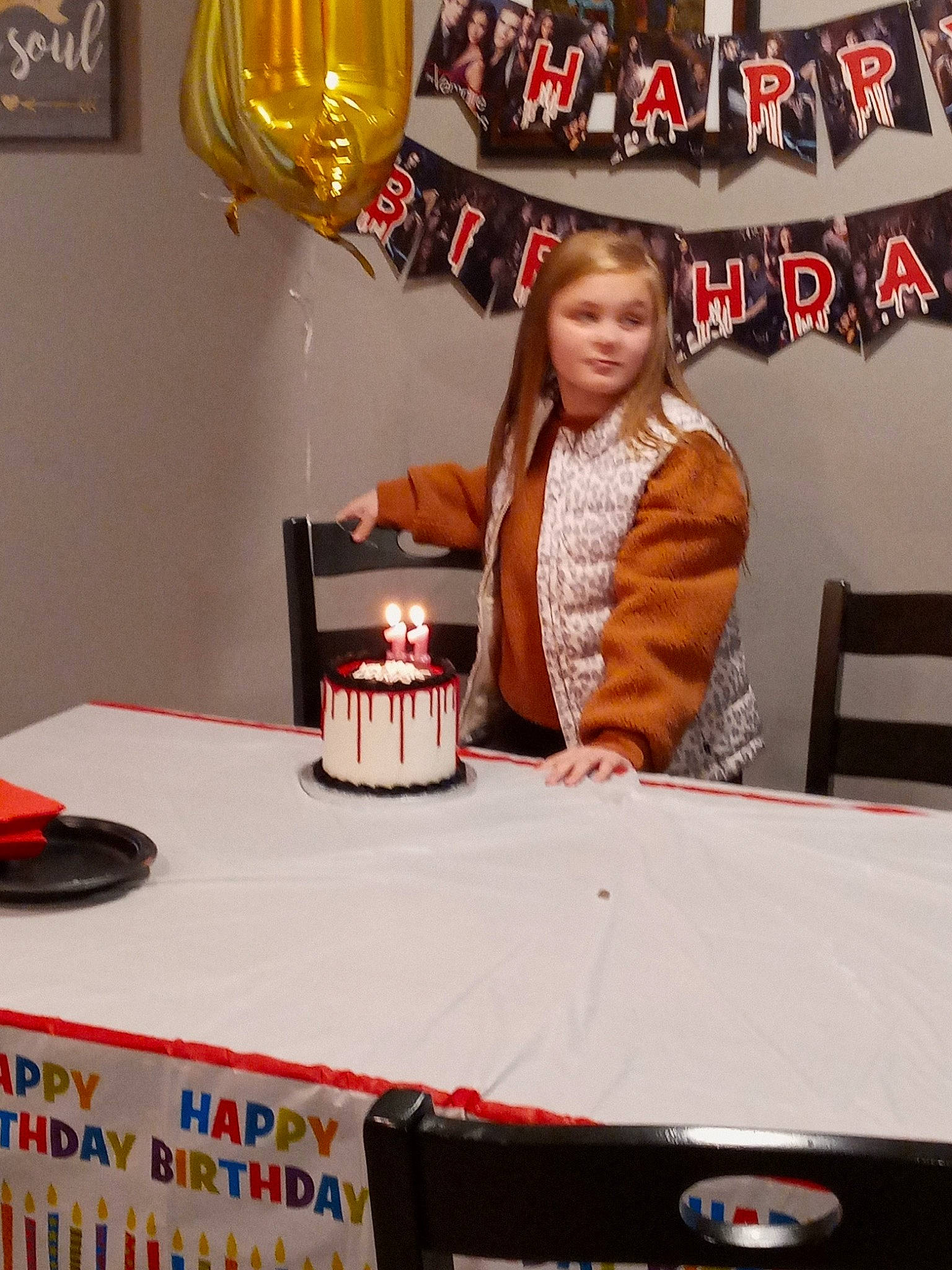 Amber is registered to the contest to win money with this photo: balloon, cake, cake_decorating, candle, event, fashion_design, fun, lamp, lighting, linens, party_supply, person, picture_frame, plate, recreation, room, t_shirt, table, tablecloth, tableware