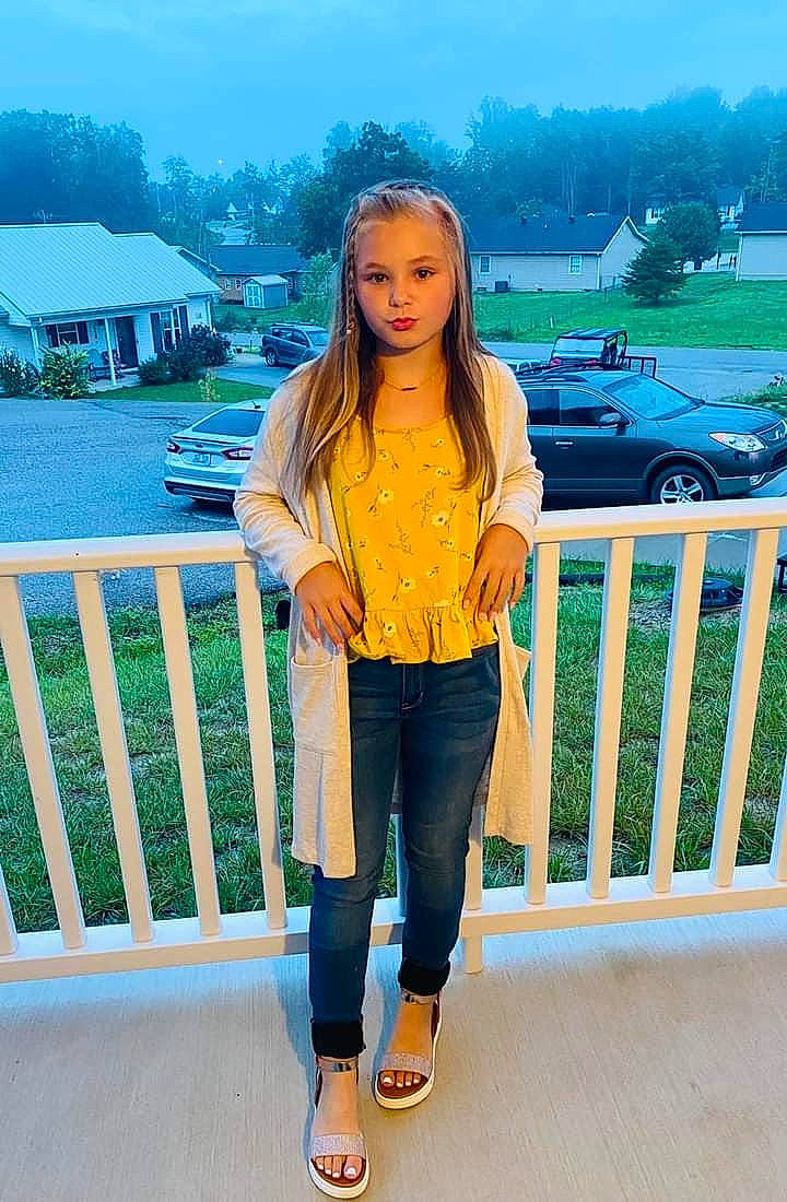 Amber joined the competition — help win amazing prizes! azure, bag, blue, denim, electric_blue, fence, footwear, happy, knee, leg, leisure, person, shoe, sky, sleeve, standing, street_fashion, t_shirt, thigh, travel