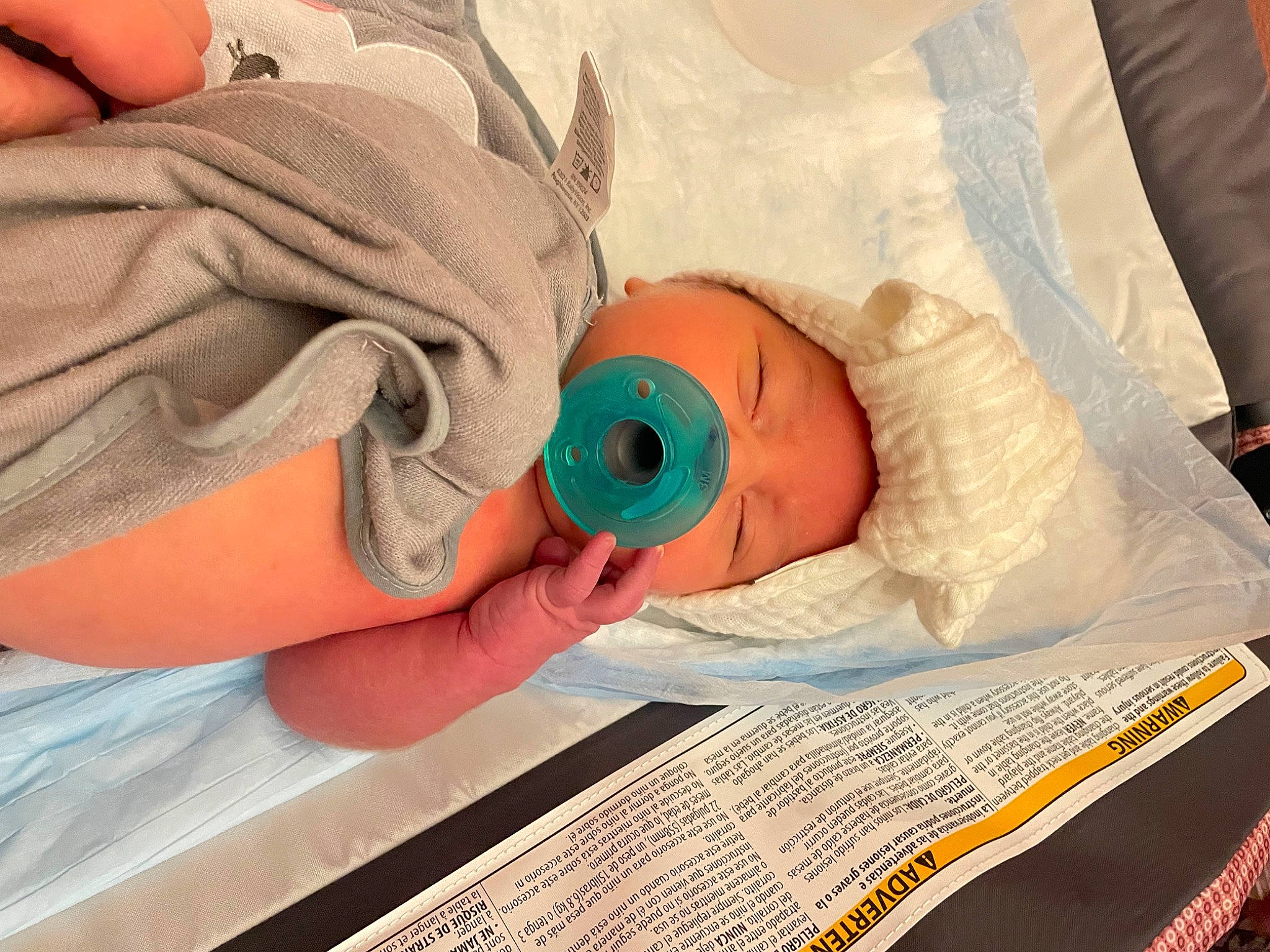 Laurel is registered to the contest to win money with this photo: baby, baby_products, baby_toddler_clothing, child, comfort, fashion_accessory, finger, health_care, hospital, linens, medical, medical_equipment, nail, person, room, service, thumb, toddler, wrist