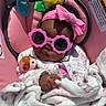 baby, child, pink, sunglasses, headband, blanket, car_seat, pacifier, toy, cute, infant, portrait, fashion, accessory, child_seat, cozy, indoor, smile, sleepy, relaxed