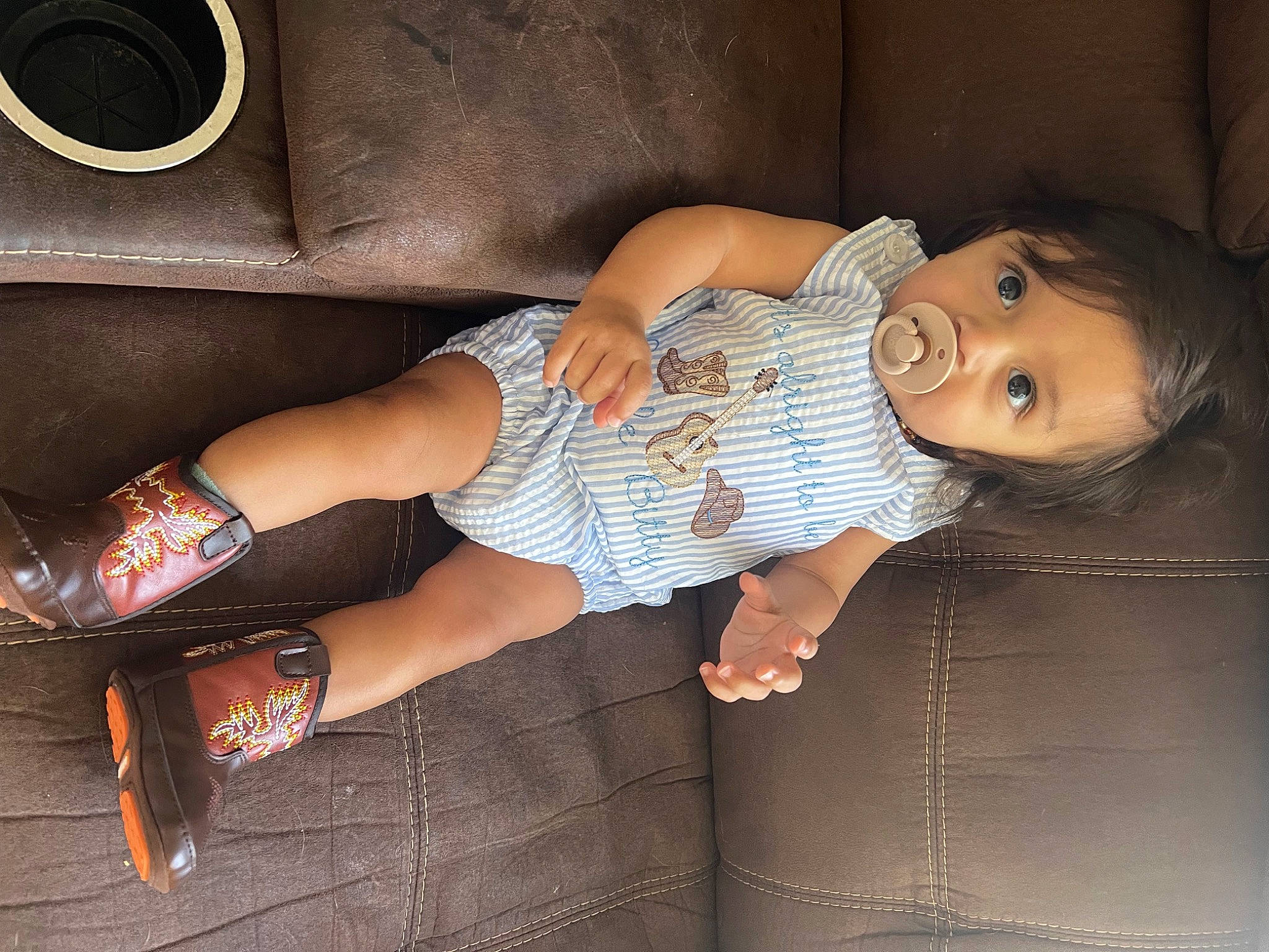 Boston joined the competition — help win amazing prizes! baby_toddler_clothing, blond, comfort, elbow, flash_photography, foot, hat, human_leg, joint, knee, lap, leg, pattern, person, plaid, shoe, shorts, sitting, sock, sportswear