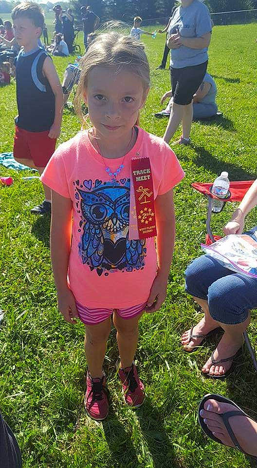 Alexis is registered to the contest to win money with this photo: adaptation, child, community, fun, grass, lawn, person, plant, play, style, summer, t_shirt