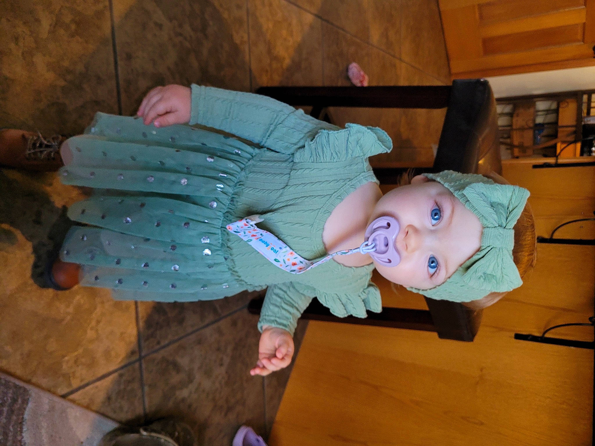Shaylee is registered to the contest to win money with this photo: child, fun, happy, hat, headwear, person, room, shelf, sitting, smile, toddler, tree, vacation, wood