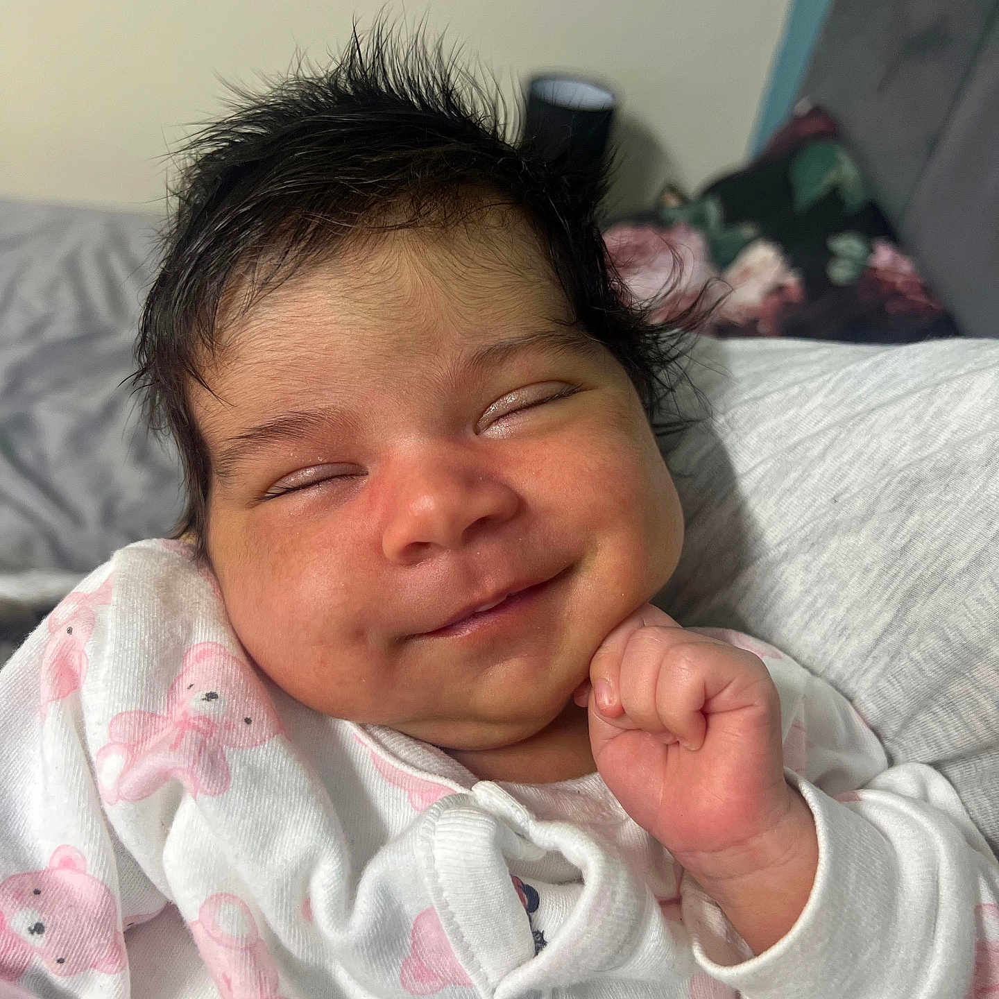 Savreen Kaur is registered to the contest to win money with this photo: baby, bedroom, blanket, cheek, closeup, comfort, cute, face, fist, hair, hand, indoors, infant, onesie, pink, skin, sleepy, smiling, soft, teddy_bear