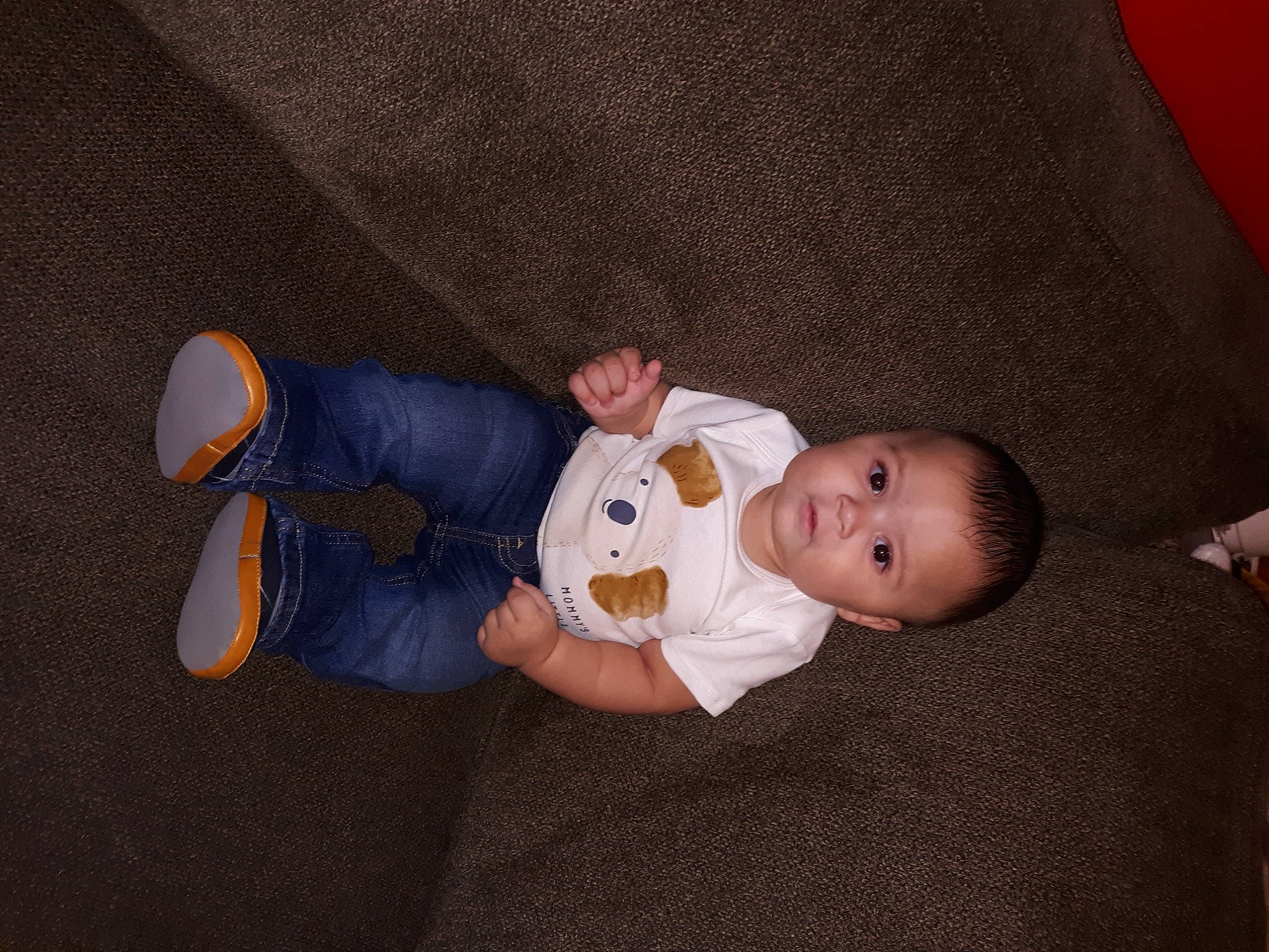 Braylen is registered to the contest to win money with this photo: baby, baby_products, baby_toddler_clothing, child, comfort, finger, flooring, foot, knee, linens, person, room, sitting, skin, sleeve, smile, sock, thumb, toddler, wood