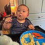 Waylon joined the competition — help win amazing prizes! baby, carrots, cheese_sticks, child, cute, eating, expression, face, food, hands, high_chair, indoor, kitchen, mashed_food, meal_time, messy_face, person, plastic_plate, plate, toddler