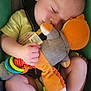 Olliemore is registered to the contest to win money with this photo: baby, bed, bodypart, clothing, couch, cushion, face, finger, furniture, hand, head, homedecor, hosiery, newborn, person, photography, portrait, sleeping, sock, toy