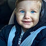 Cayden participe au concours pour gagner de l'argent avec cette photo : baby, child, blue_eyes, smile, jacket, seatbelt, portrait, face, closeup, cute, young_child, warm_clothing, infant, person, indoor, casual, head_and_shoulders, happy, light, expression