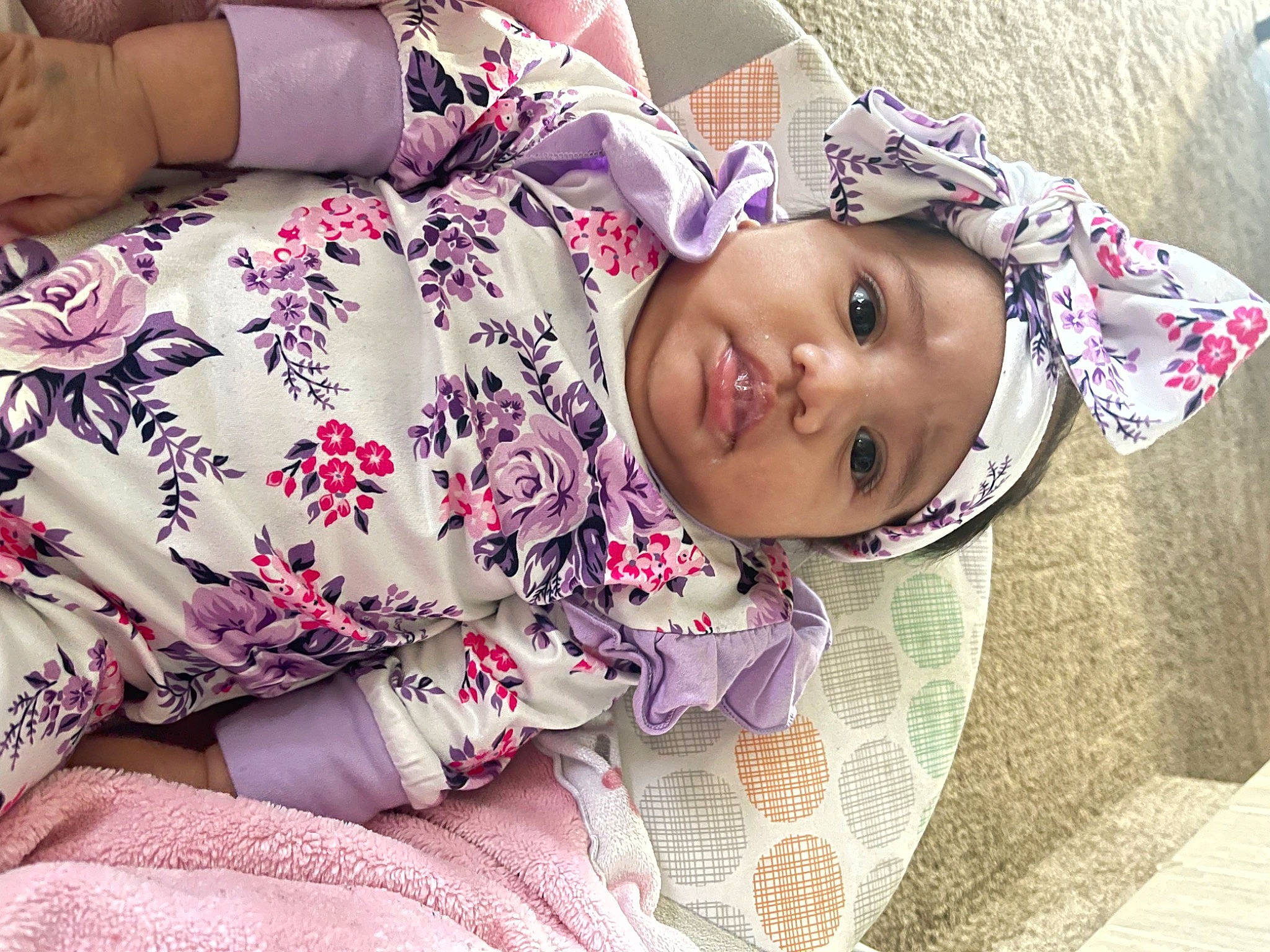 Aryah joined the competition — help win amazing prizes! beauty, child, comfort, cool, fashion_accessory, happy, hat, headwear, human_body, linens, lip, magenta, pattern, person, pink, purple, skin, sleeve, smile, thigh