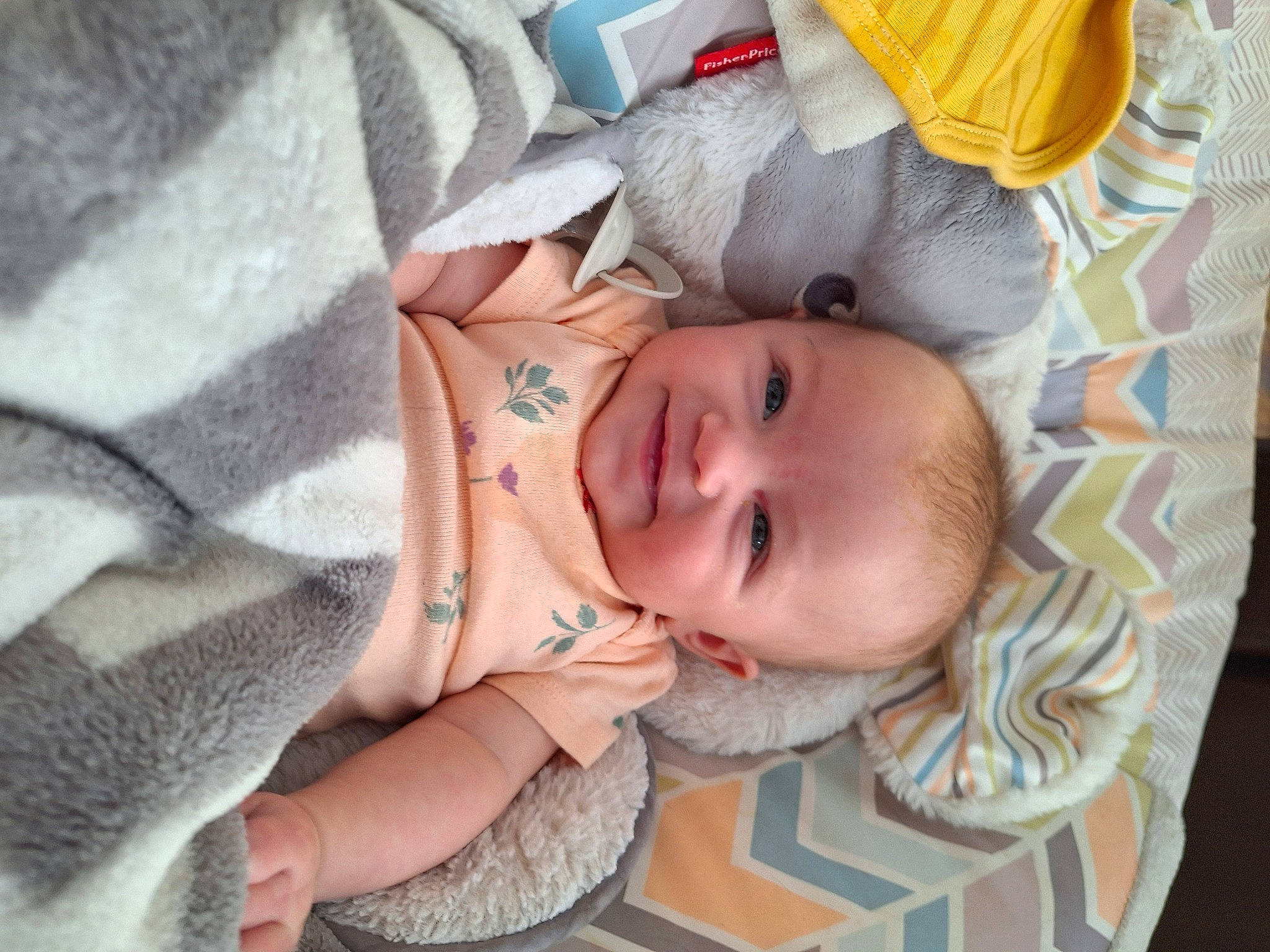 Ellie is registered to the contest to win money with this photo: baby, baby_products, baby_toddler_clothing, cheek, child, comfort, eye, face, facial_expression, finger, hand, happy, hat, head, mouth, nose, person, skin, sleeve, smile