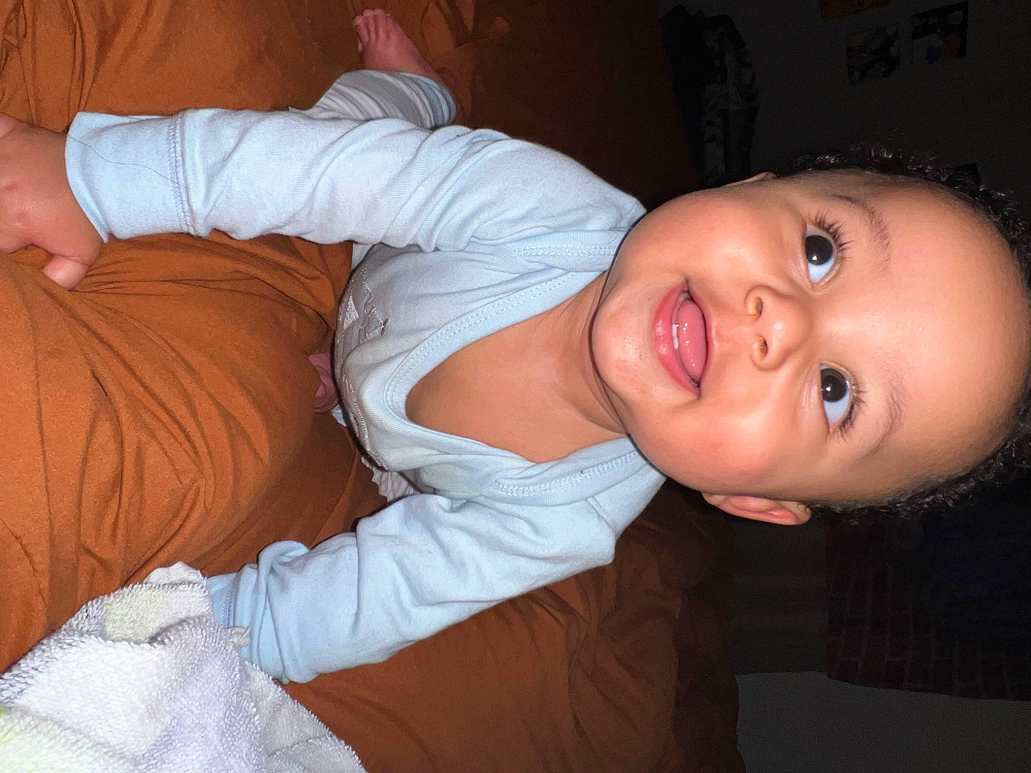 Archer is registered to the contest to win money with this photo: arm, baby, baby_toddler_clothing, cheek, child, comfort, ear, elbow, finger, flash_photography, human_body, iris, lip, mouth, nose, person, skin, sleeve, smile, toddler