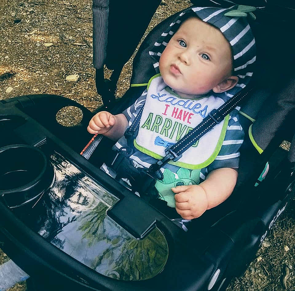 Bentley is registered to the contest to win money with this photo: baby, car, child, cool, green, happy, headwear, person, play, product, smile, toddler, vehicle, vehicle_door