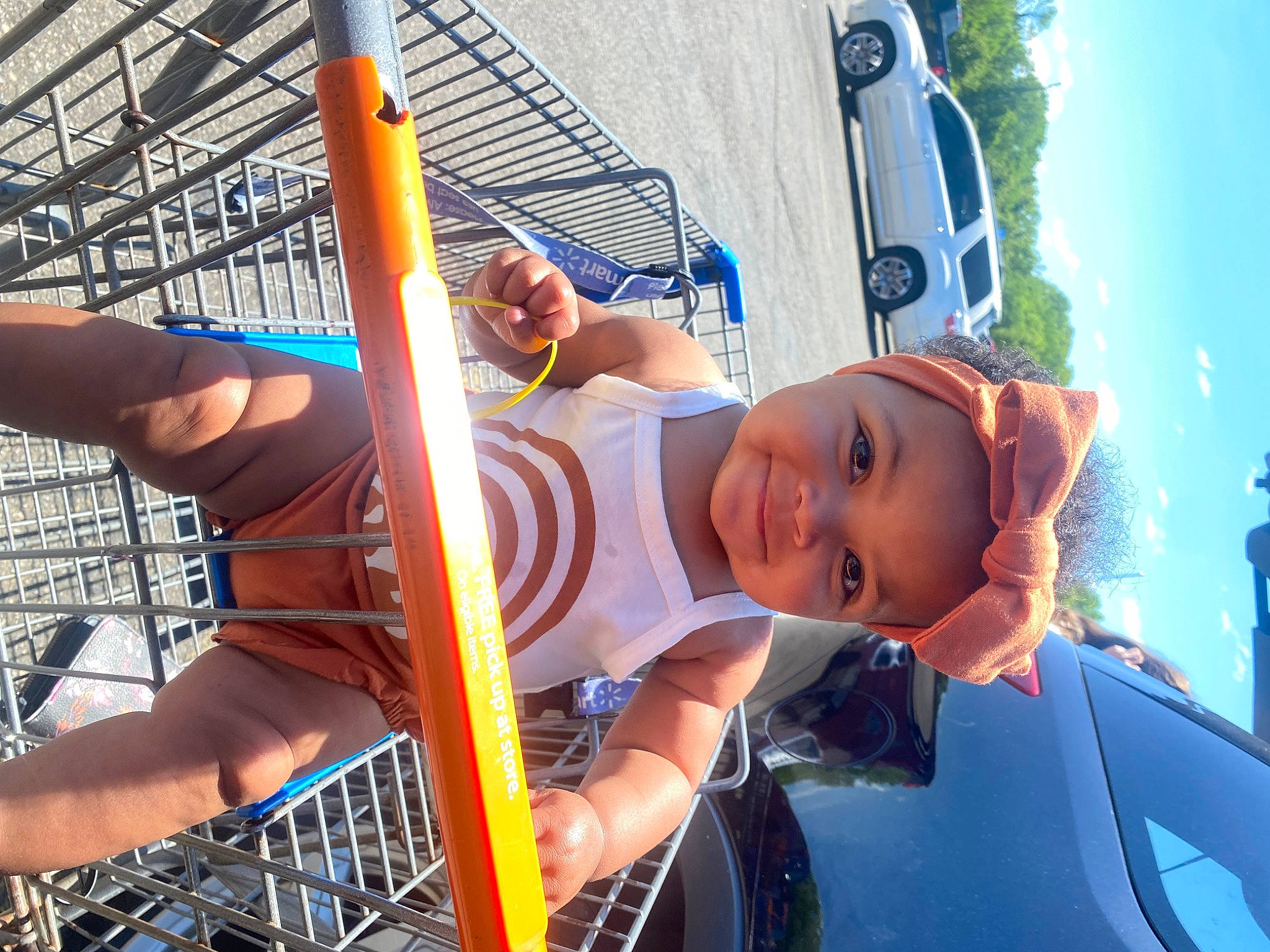 Oliana joined the competition — help win amazing prizes! amusement_ride, automotive_exterior, baby, blue, child, city, electric_blue, family_car, fun, headwear, hood, joy, leisure, motor_vehicle, outdoor_play_equipment, person, recreation, shopping_cart, sky, toddler