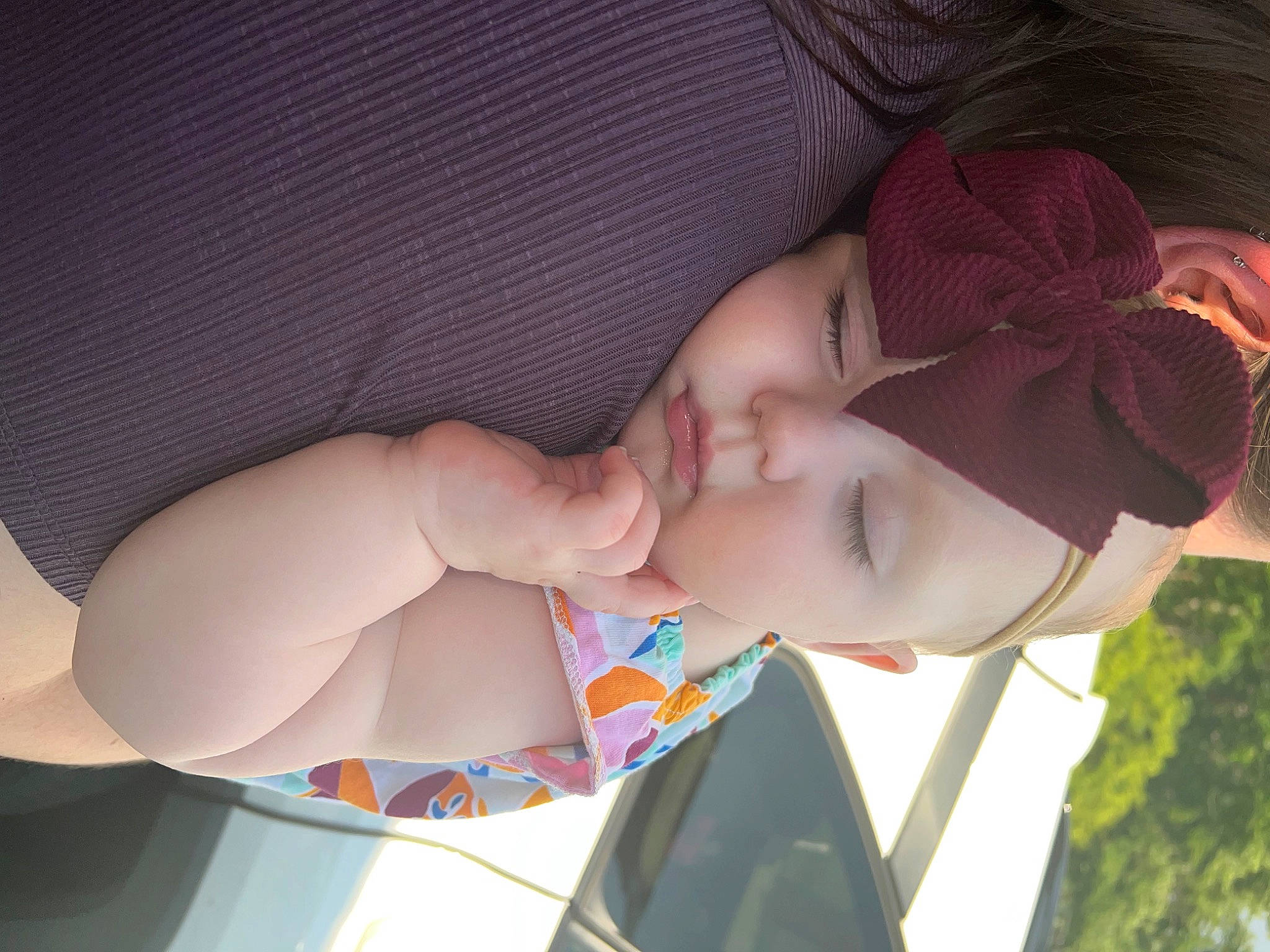 Emmalyn is registered to the contest to win money with this photo: arm, baby, child, comfort, elbow, eye, eyelash, finger, hand, happy, head, headwear, joint, lip, mouth, nail, neck, nose, pattern, person