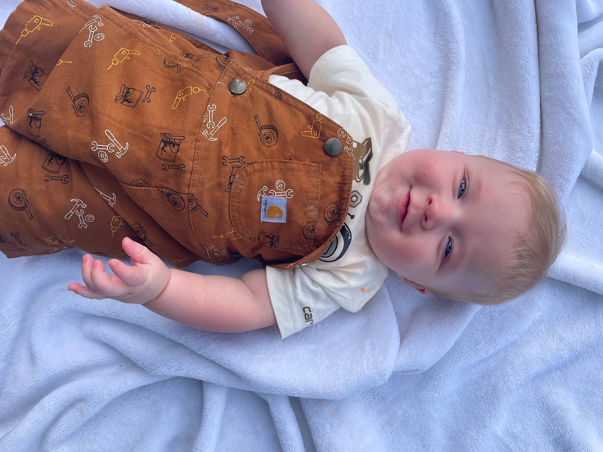 Lewis joined the competition — help win amazing prizes! abdomen, baby, baby_toddler_clothing, child, comfort, dress, elbow, eye, finger, gesture, hand, happy, human_body, joy, nail, pattern, person, sitting, skin, sleeve