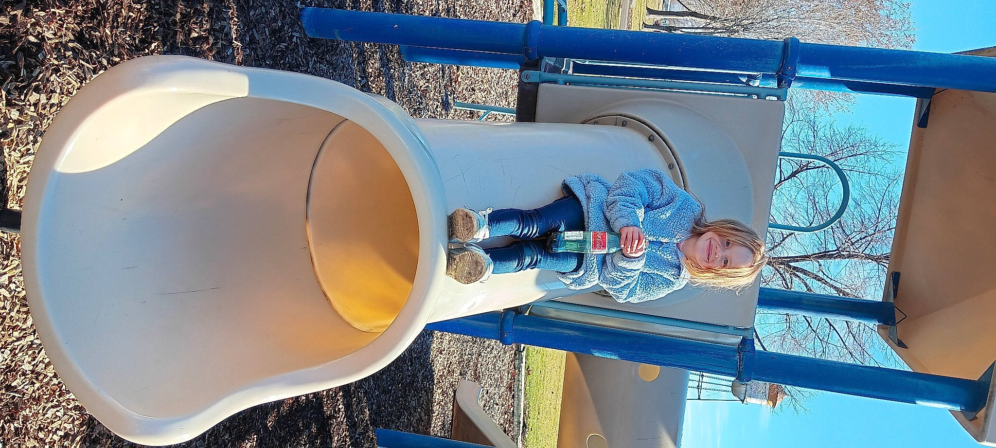 Ellie is registered to the contest to win money with this photo: aerospace_engineering, aircraft_engine, blue, composite_material, cylinder, electric_blue, engineering, gas, hat, joy, light, line, machine, metal, musical_instrument, person, photograph, pipe, space, vehicle