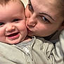 Charlie joined the competition — help win amazing prizes! baby, child, adult, face, smile, kiss, affection, close_up, skin, person, happy, love, family, cute, expression, casual_clothing, indoor, head, cheek, warmth