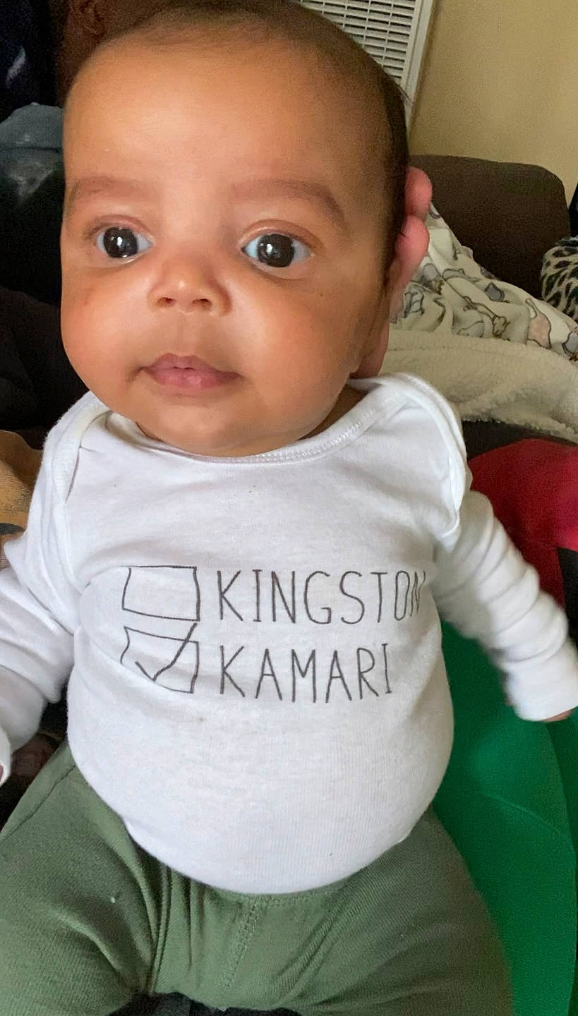 Kamari joined the competition — help win amazing prizes! baby, baby_toddler_clothing, cheek, cool, eye, eyebrow, face, finger, gesture, happy, iris, lip, mammal, mouth, neck, nose, person, skin, sleeve, smile