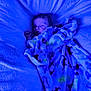 David is registered to the contest to win money with this photo: baby, blanket, sleeping, blue_light, dinosaur_pattern, soft_texture, cozy, infant, bed, resting, cute, child, portrait, peaceful, toddler, warm, comfort, indoors, young_child, sleep