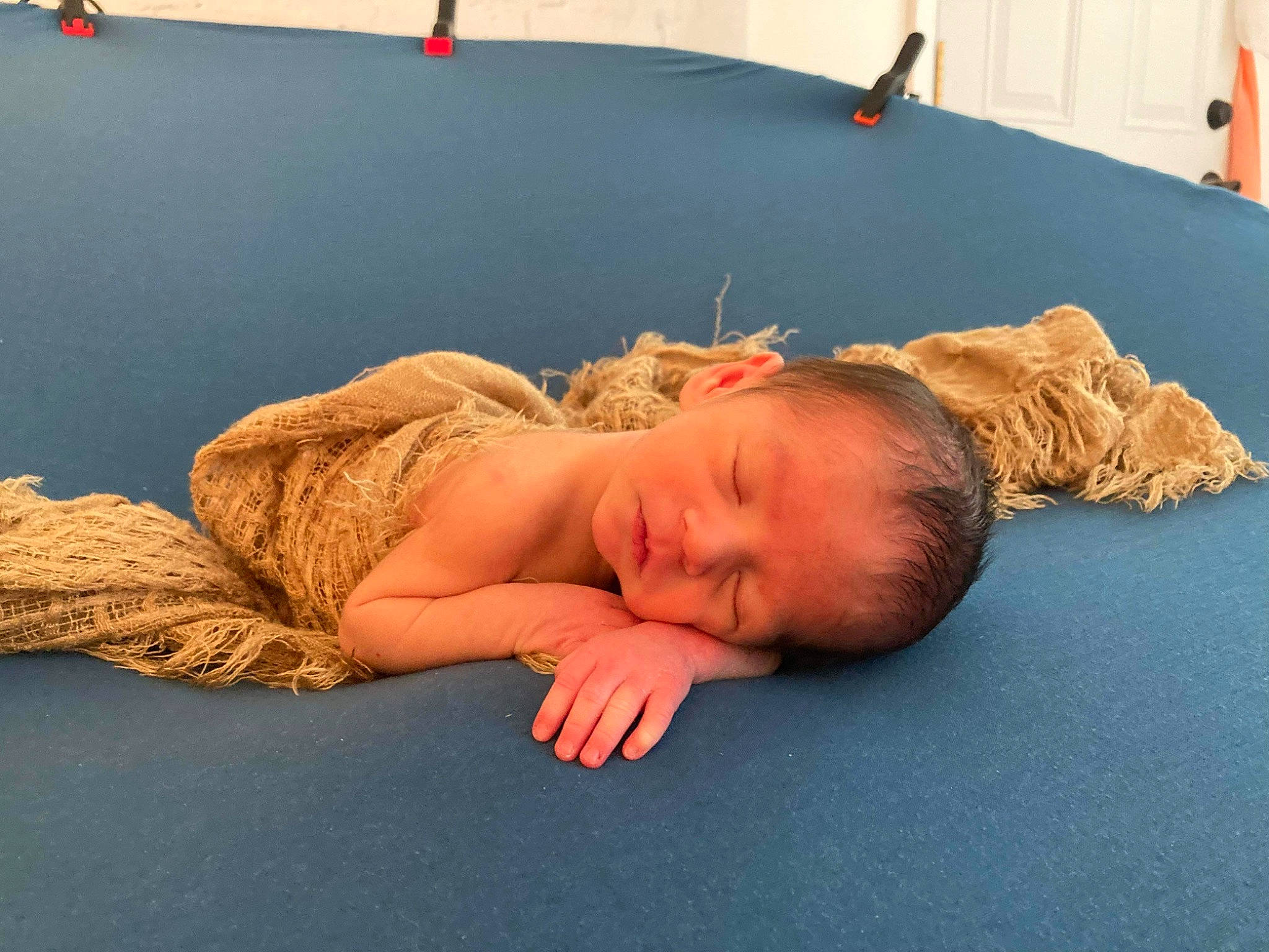 Ashton is registered to the contest to win money with this photo: baby, barefoot, child, comfort, elbow, floor, flooring, fun, grass, hardwood, human_body, joint, knee, leisure, nap, person, physical_fitness, room, sitting, toddler