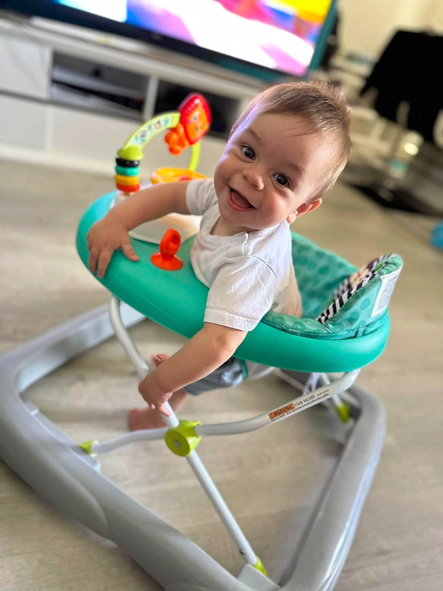 Amari is registered to the contest to win money with this photo: baby, baby_playing_with_toys, baby_products, baby_toddler_clothing, baby_toys, child, fun, happy, joy, knee, leisure, person, play, recreation, shorts, sitting, smile, stuffed_toy, thigh, toddler