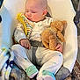 Grady joined the competition — help win amazing prizes! baby, baby_swing, blanket, carpet, child, clothing, comfort, cute, flooring, footwear, frog_socks, indoor, nap_time, pajamas, peaceful, person, rest, sleeping, soft_toy, teddy_bear