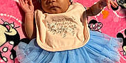 Amariaya joined the competition — help win amazing prizes! baby, infant, tutu, headband, bib, pink_blanket, minnie_mouse, cartoon, socks, frills, cute, lying_down, clothing, pattern, colorful, soft_texture, child, portrait, indoor, sleepy