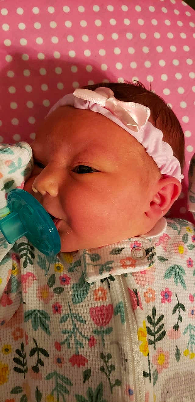 Bethany is registered to the contest to win money with this photo: bedtime, cheek, child, day, eye, face, forehead, girl, head, infant, lip, mouth, nose, person, pink, play, product, skin, sleep, textile