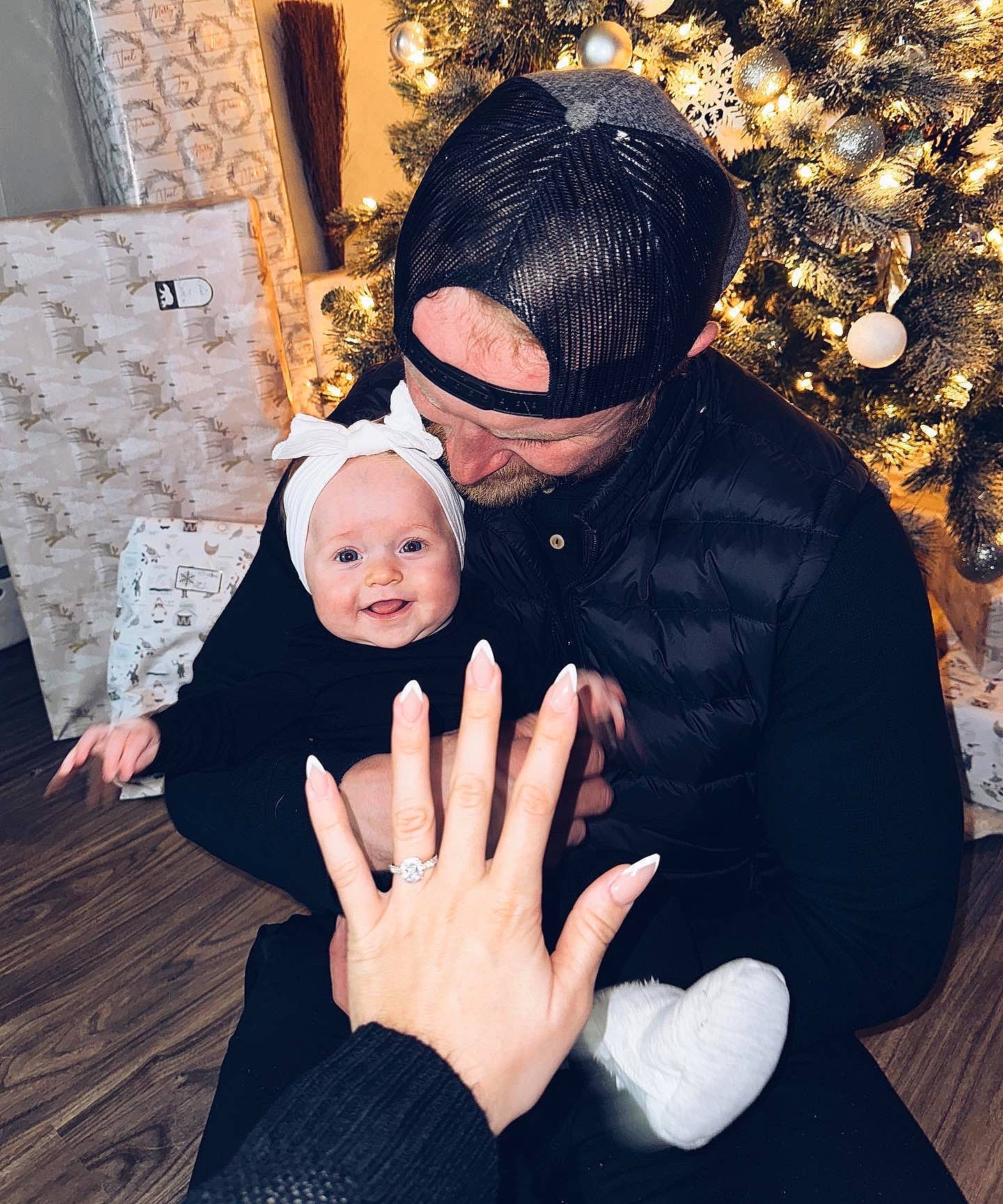 Lylah joined the competition — help win amazing prizes! baby, child, cool, curtain, event, flash_photography, formal_wear, fun, gesture, happy, headwear, holiday, human, human_body, ornament, person, smile, snapshot, suit, thumb