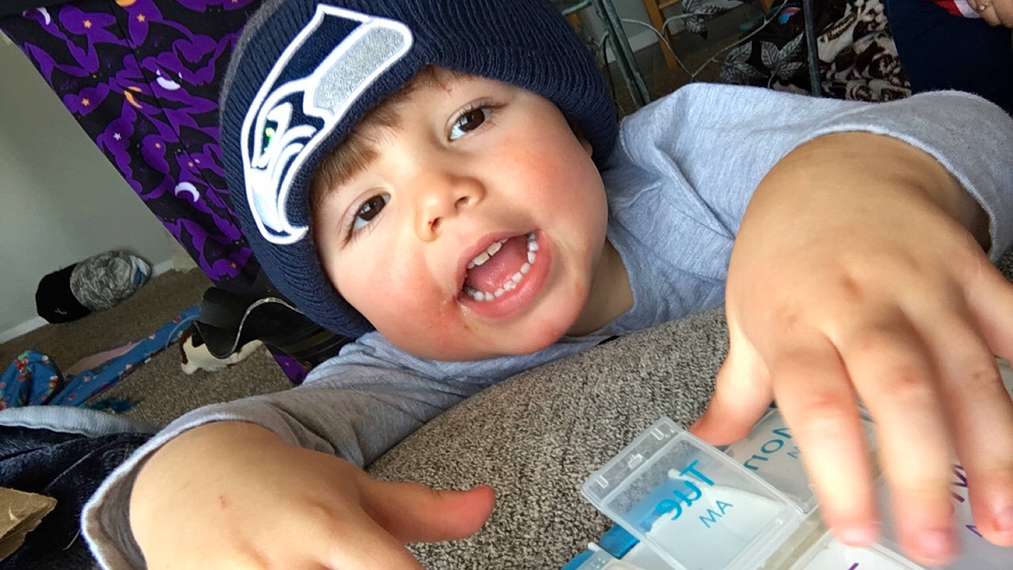 Kamden joined the competition — help win amazing prizes! baby, cap, cheek, child, cool, finger, headgear, headwear, person, smile, toddler