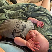 Stewart joined the competition — help win amazing prizes! arm, baby, blanket, casual, clothing, footwear, hand, head, indoor, infant, lap, peaceful, person, relaxation, rest, skin, sleeping, stroller, toddler, water_bottle