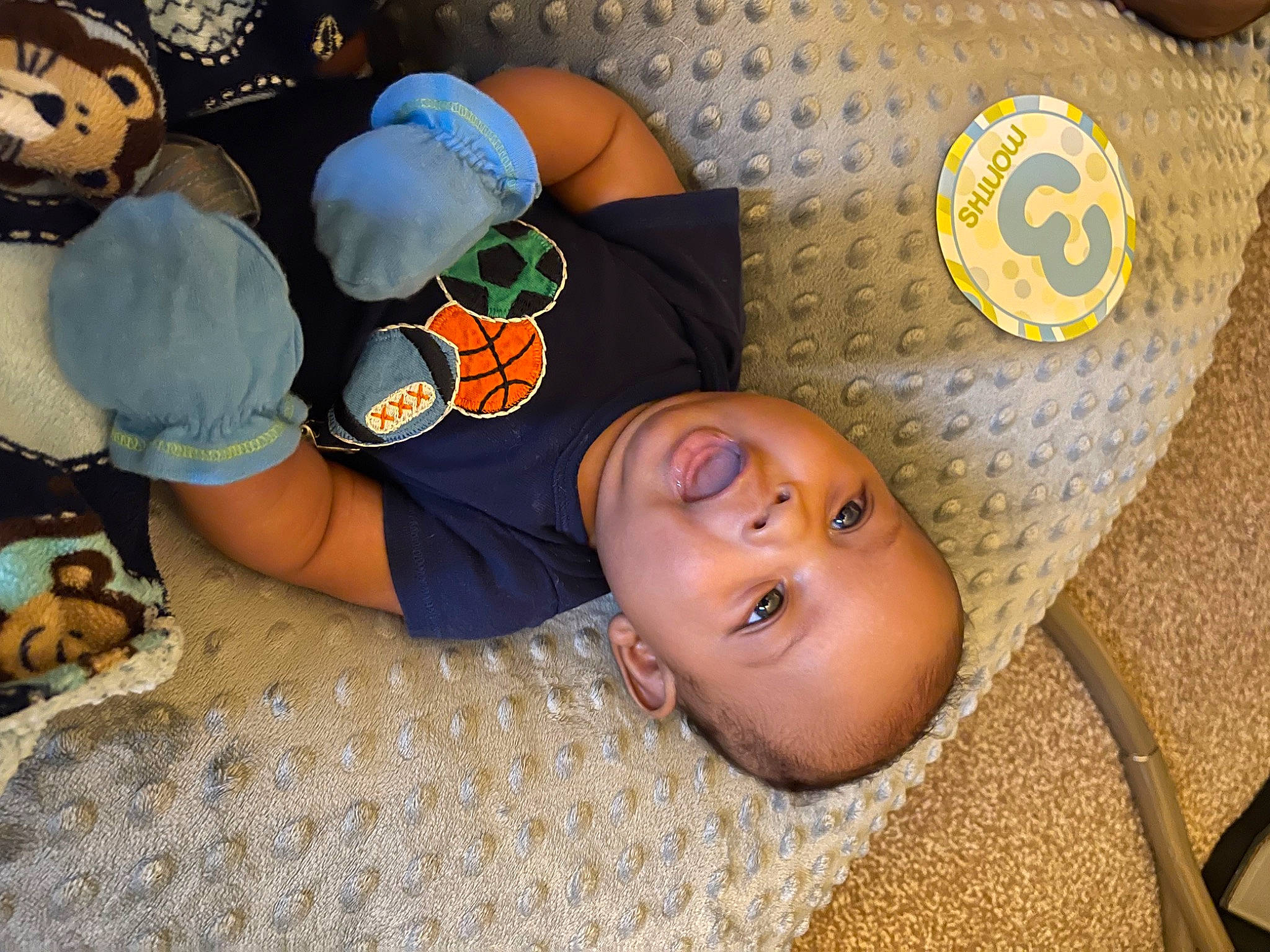 Jr joined the competition — help win amazing prizes! baby, baby_toddler_clothing, baseball_cap, cap, child, comfort, cool, flooring, fun, hairstyle, hat, linens, logo, mouth, people, person, room, sitting, t_shirt, textile