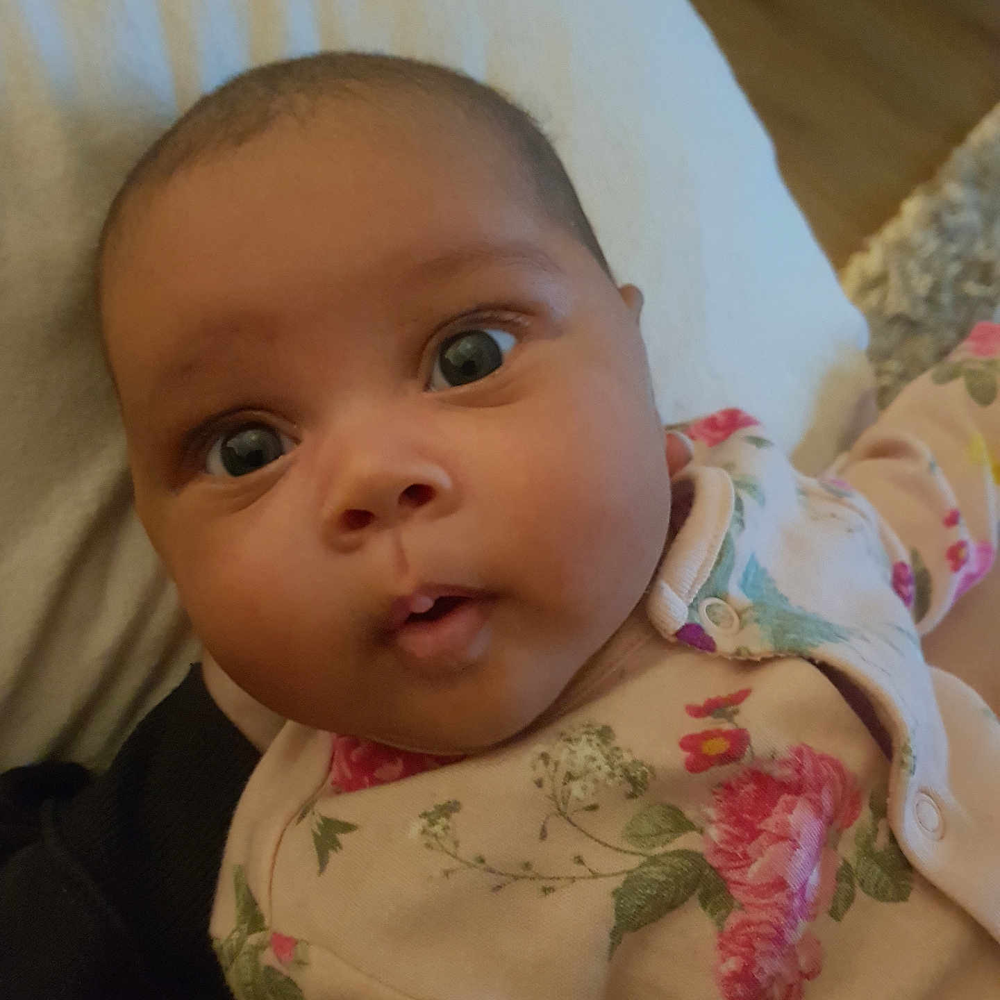 Mavie joined the competition — help win amazing prizes! baby, bed, blanket, bodypart, bonnet, clothing, couch, cushion, face, finger, furniture, hand, hat, head, homedecor, mouth, newborn, person, photography, portrait