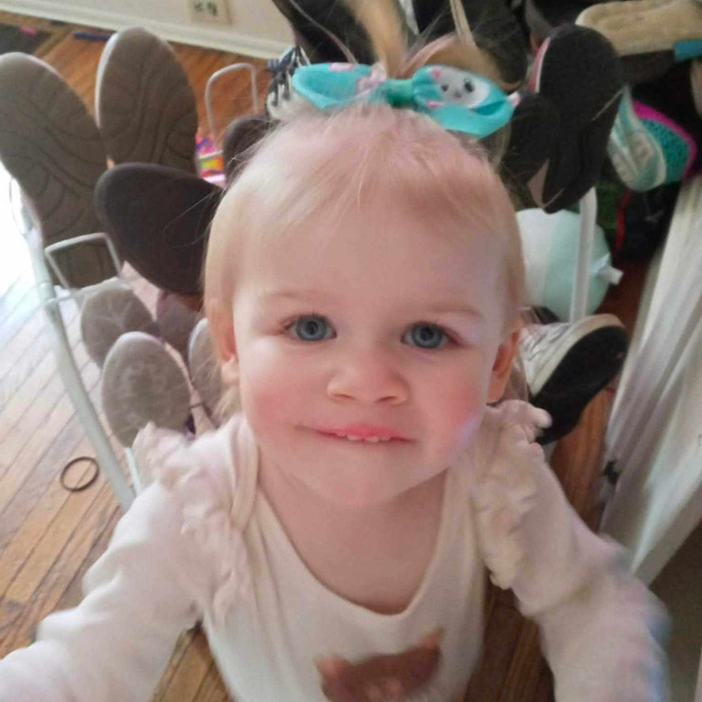 Emma joined the competition — help win amazing prizes! architecture, baby, building, chair, clothing, diningroom, diningtable, face, footwear, furniture, head, indoors, interiordesign, person, photography, portrait, room, shoe, table, wood