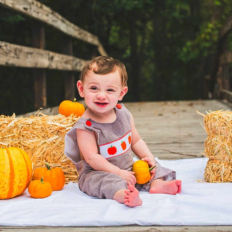 Dawson joined the competition — help win amazing prizes! architecture, baby, building, face, food, grass, head, outdoors, person, photography, plant, portrait, pottedplant, produce, pumpkin, shelter, sitting, squash, vegetable, vegetation